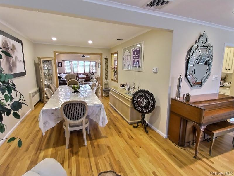 3421 Turf Road Oceanside, NY 11572 - Photo 15 of 50 a living room with a couch and a table