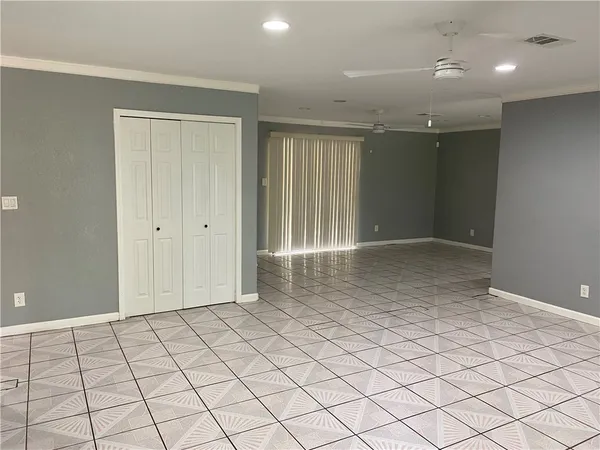 an empty room with natural light