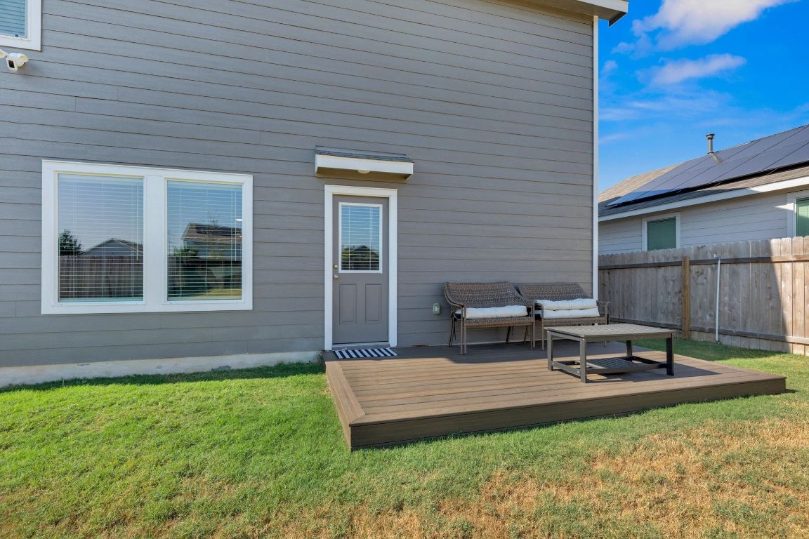 2324 Willkomen Way Pflugerville, TX 78660 - Photo 18 of 21 a wooden bench sitting in front of a house
