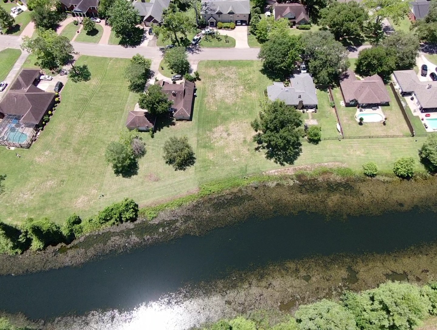2209 Riverside Drive West Columbia, TX 77486 - Photo 2 of 9 an aerial view of residential houses with outdoor space