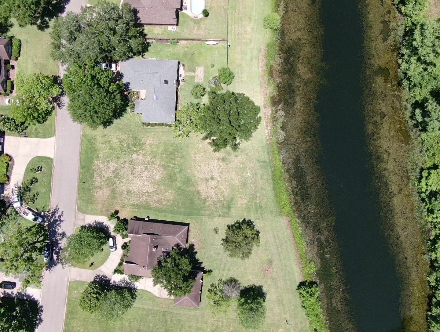 2209 Riverside Drive West Columbia, TX 77486 - Photo 5 of 9 an aerial view of a house with a yard