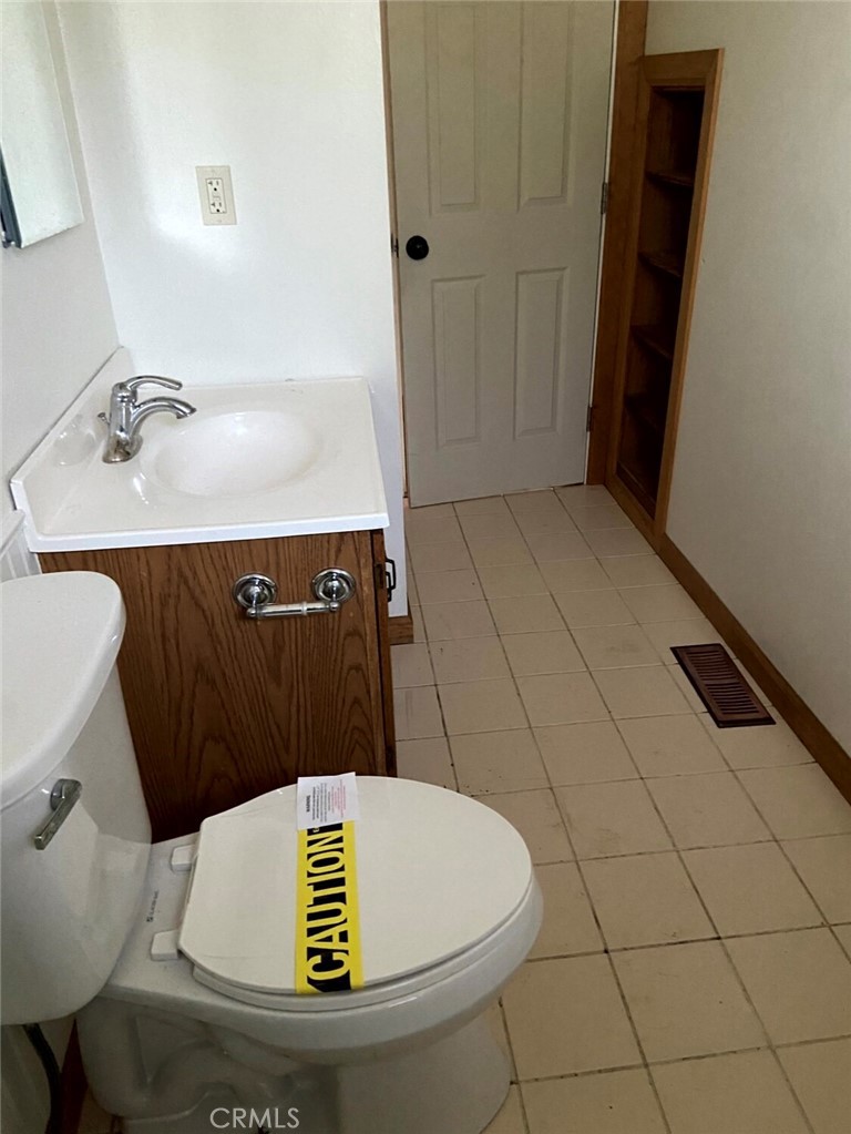204 Patterson Avenue Loyalton, CA 96118 - Photo 9 of 12 a bathroom with a sink