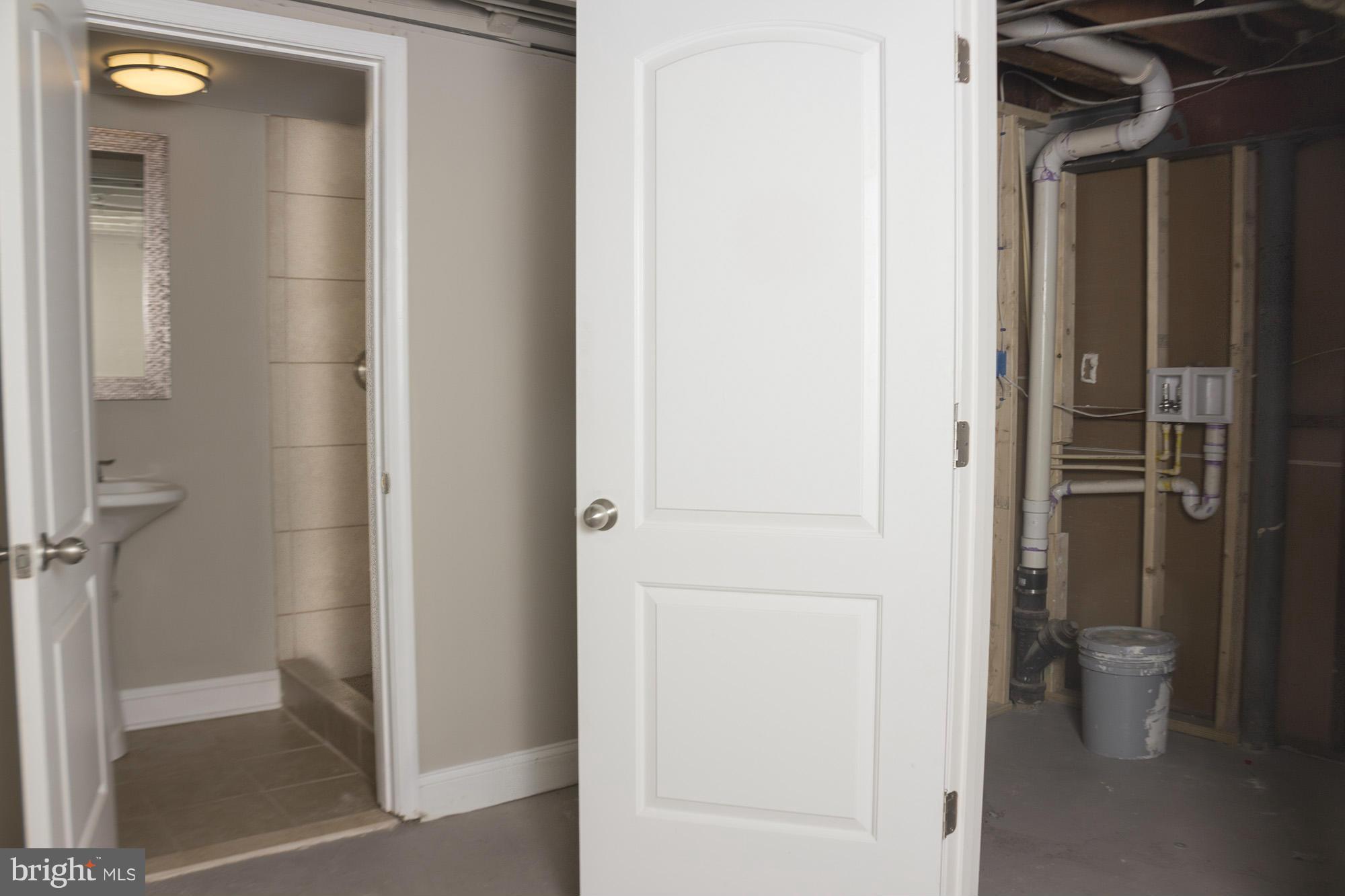 1021 Upnor Road Baltimore, MD 21212 - Photo 22 of 24 a view of a bathroom from a hallway