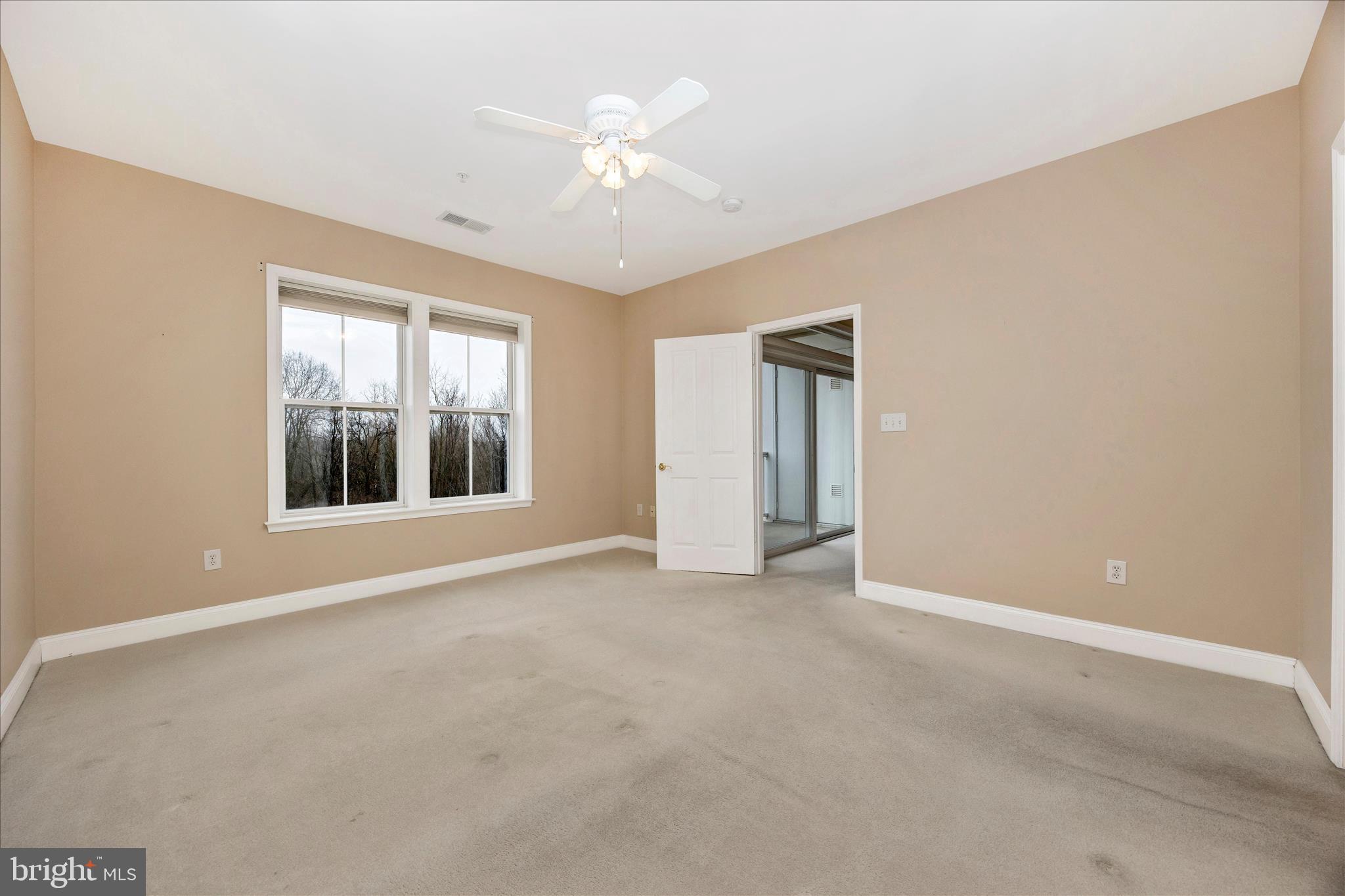 2250 Bear Den Road, Unit 207 Frederick, MD 21701 - Photo 15 of 43 a view of an empty room with a window