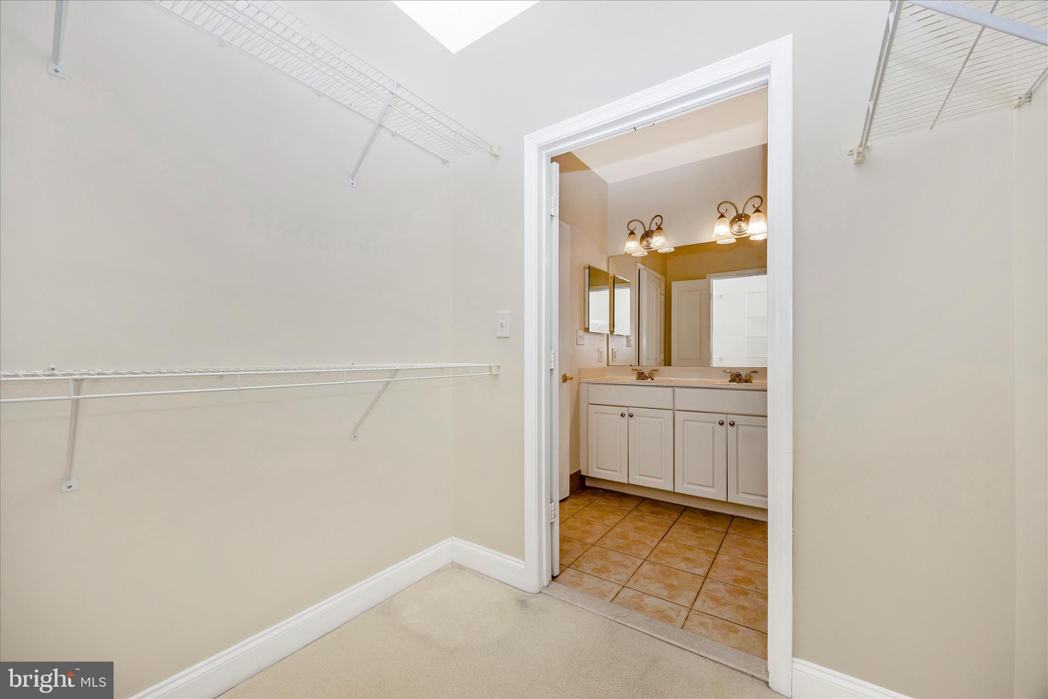 2250 Bear Den Road, Unit 207 Frederick, MD 21701 - Photo 20 of 43 a bathroom with a sink and a mirror