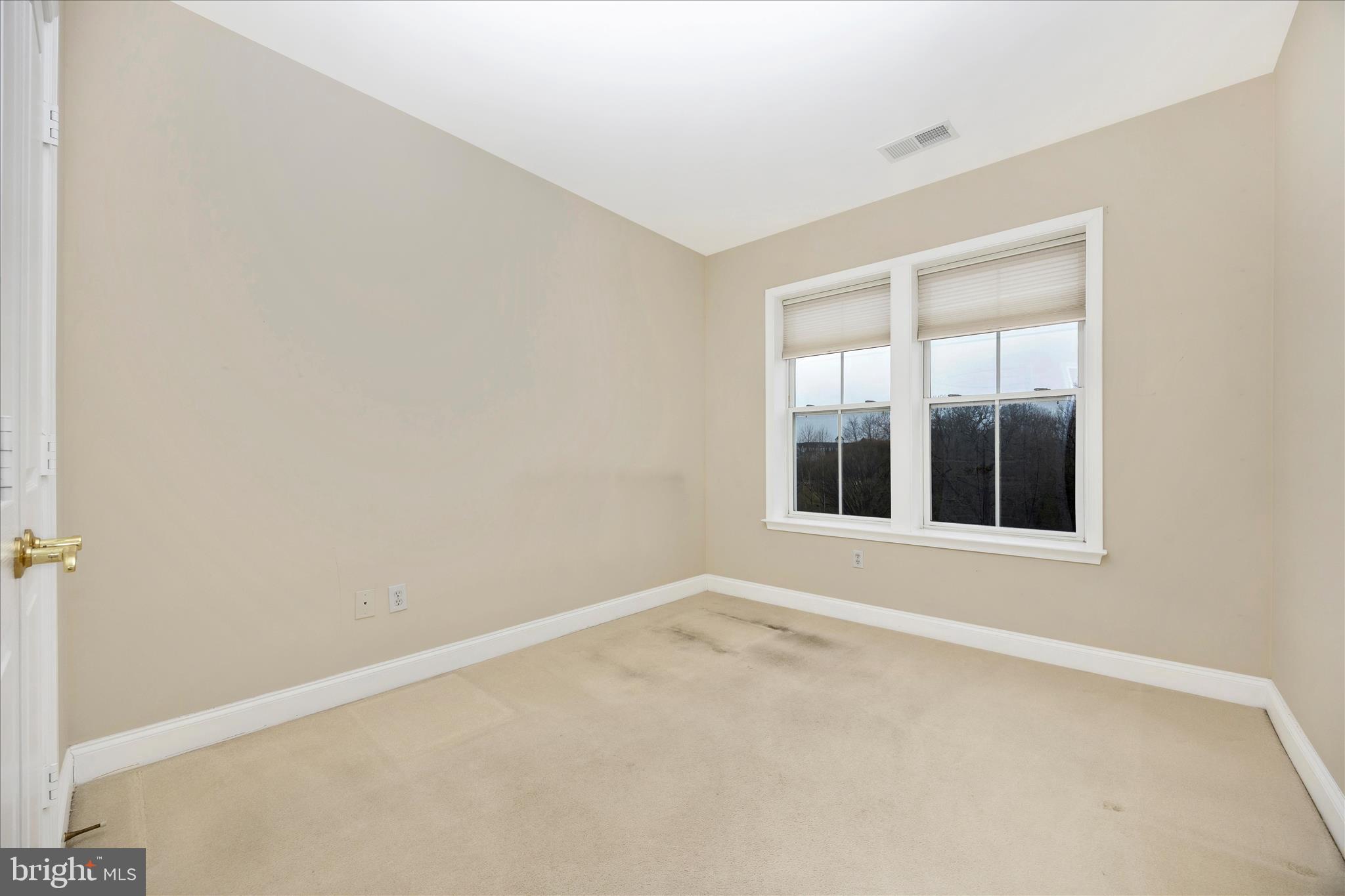 2250 Bear Den Road, Unit 207 Frederick, MD 21701 - Photo 21 of 43 an empty room with a window