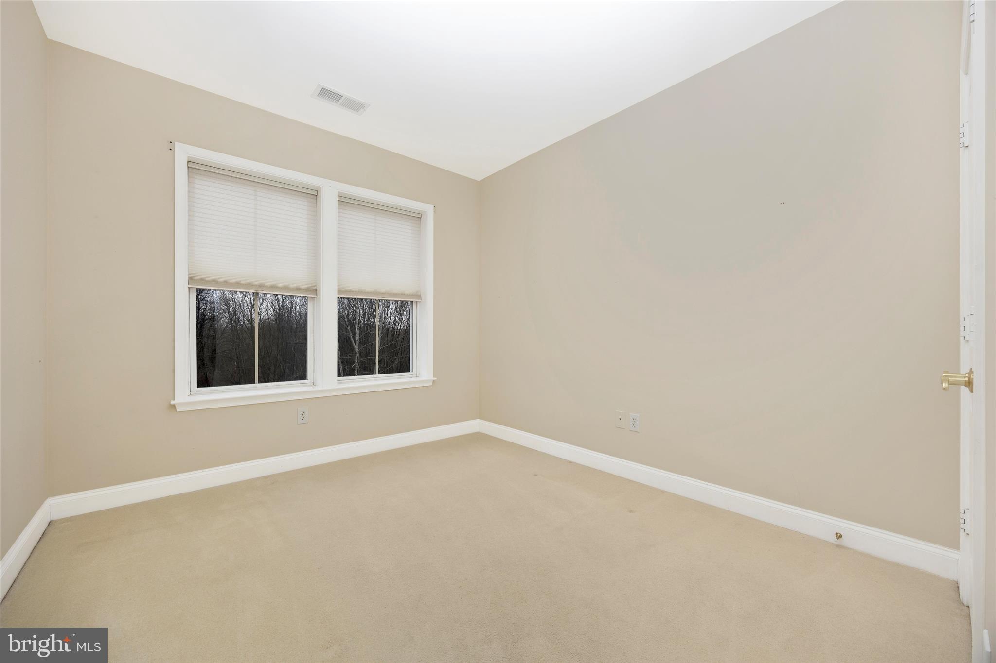 2250 Bear Den Road, Unit 207 Frederick, MD 21701 - Photo 23 of 43 an empty room with a window