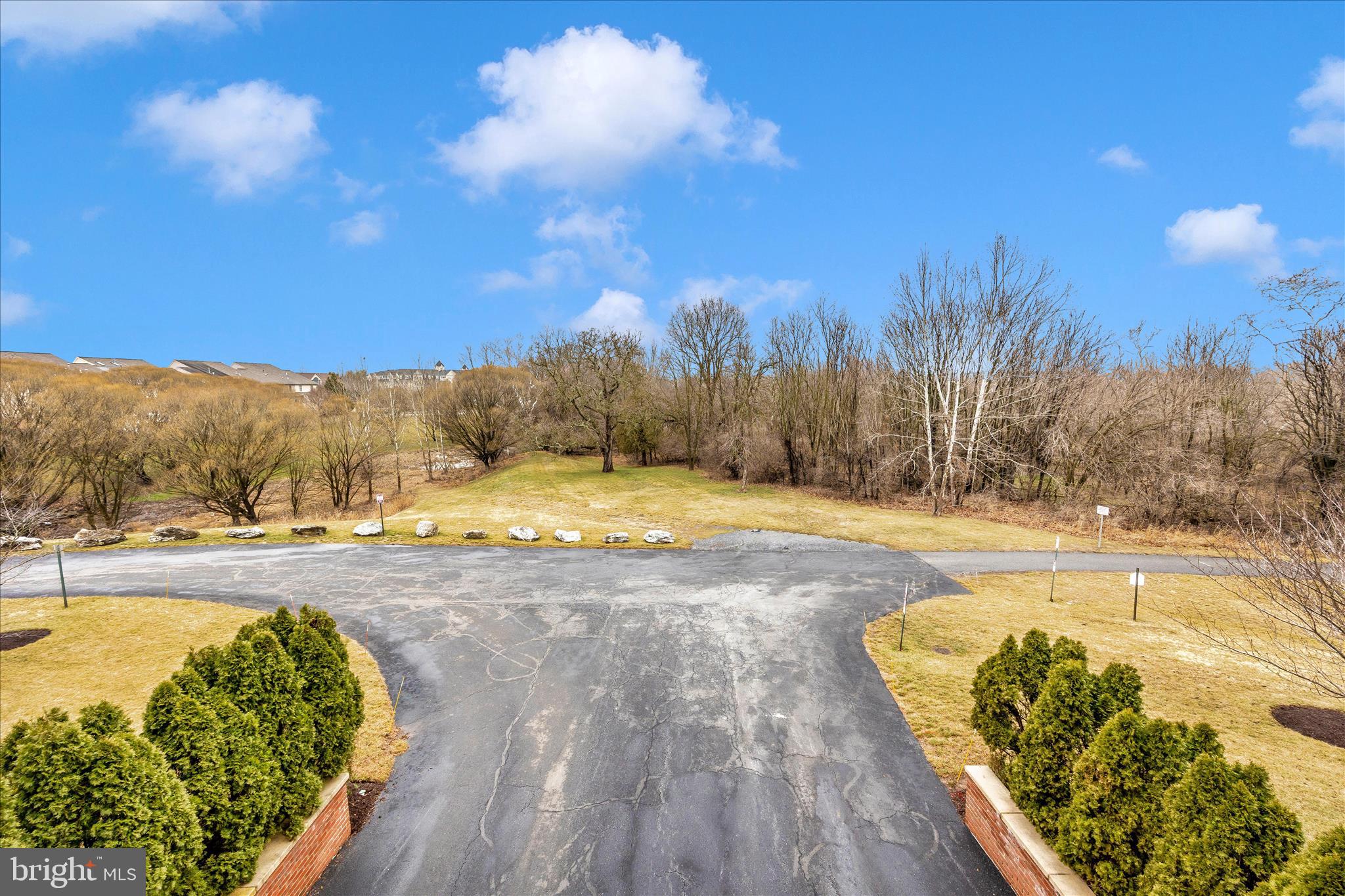 2250 Bear Den Road, Unit 207 Frederick, MD 21701 - Photo 28 of 43 a view of a yard with an outdoor space