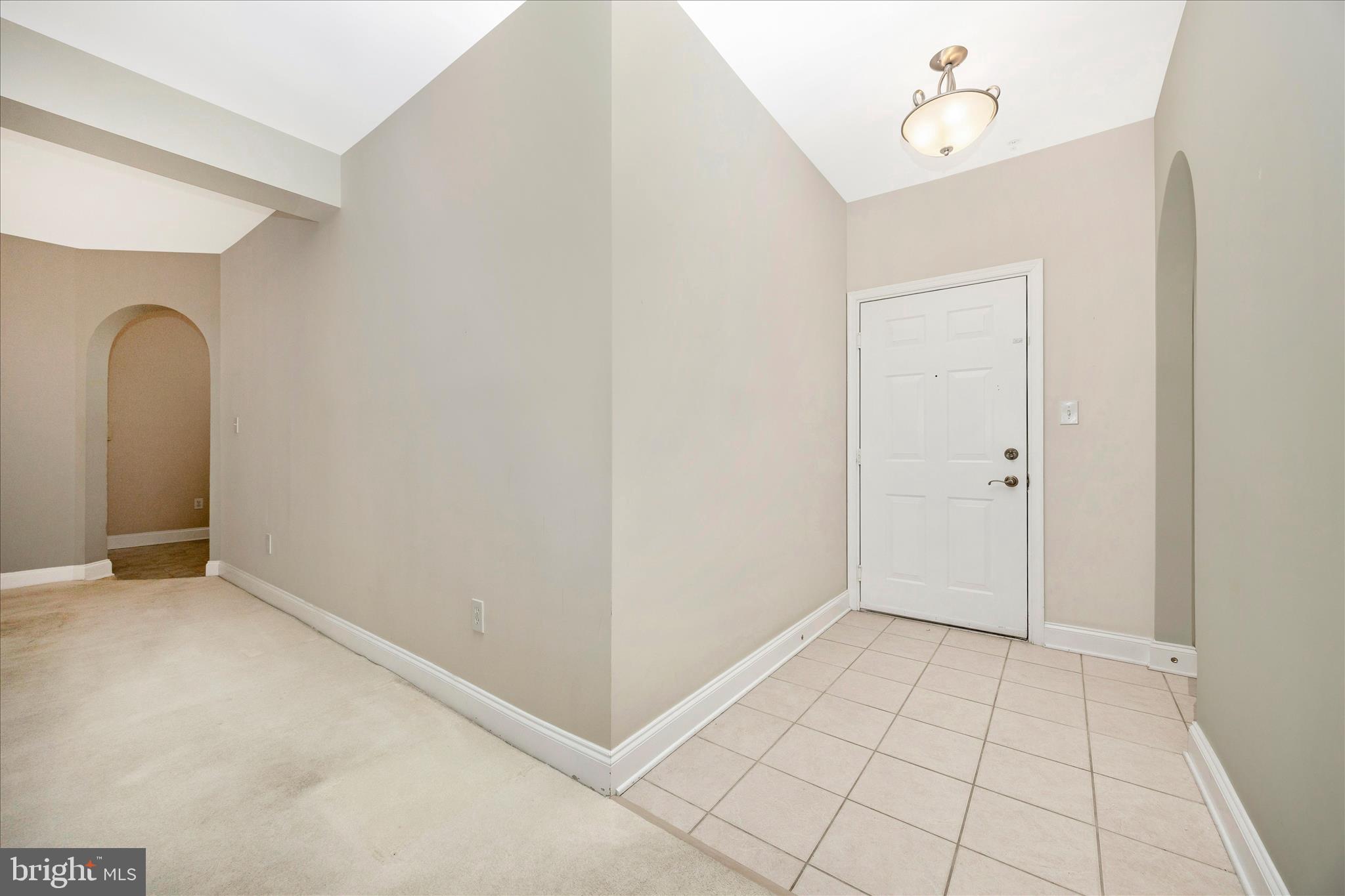 2250 Bear Den Road, Unit 207 Frederick, MD 21701 - Photo 3 of 43 an empty room with windows