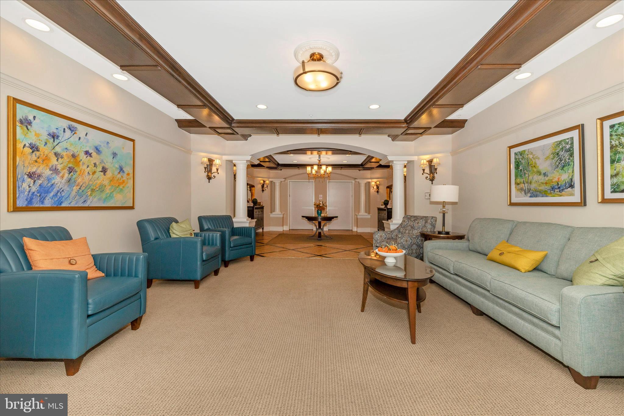 2250 Bear Den Road, Unit 207 Frederick, MD 21701 - Photo 34 of 43 a living room with furniture and a flat screen tv