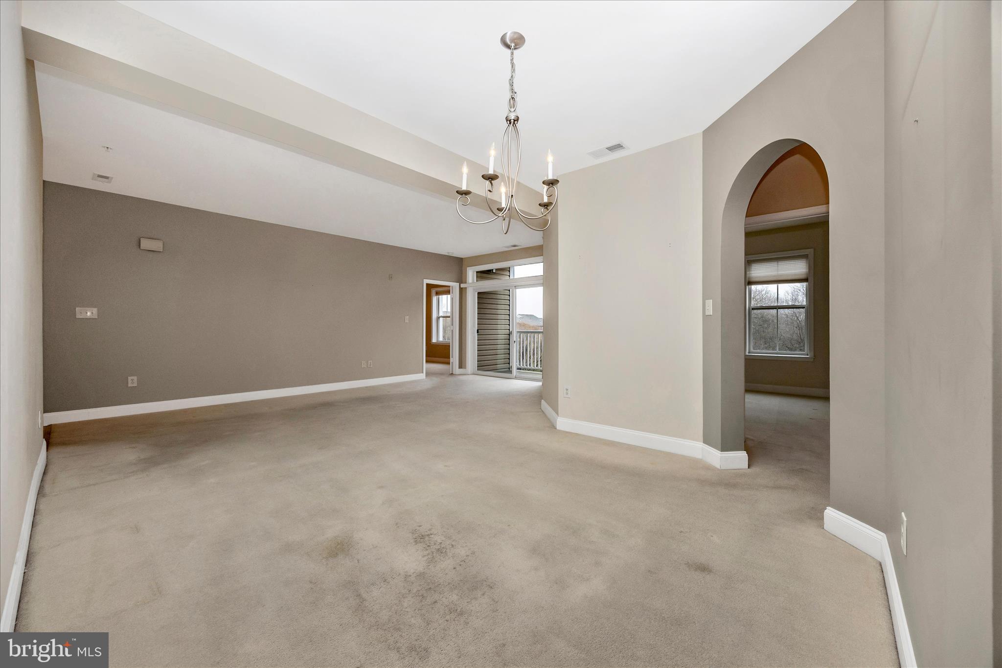 2250 Bear Den Road, Unit 207 Frederick, MD 21701 - Photo 8 of 43 a view of a room with windows and ceiling fan