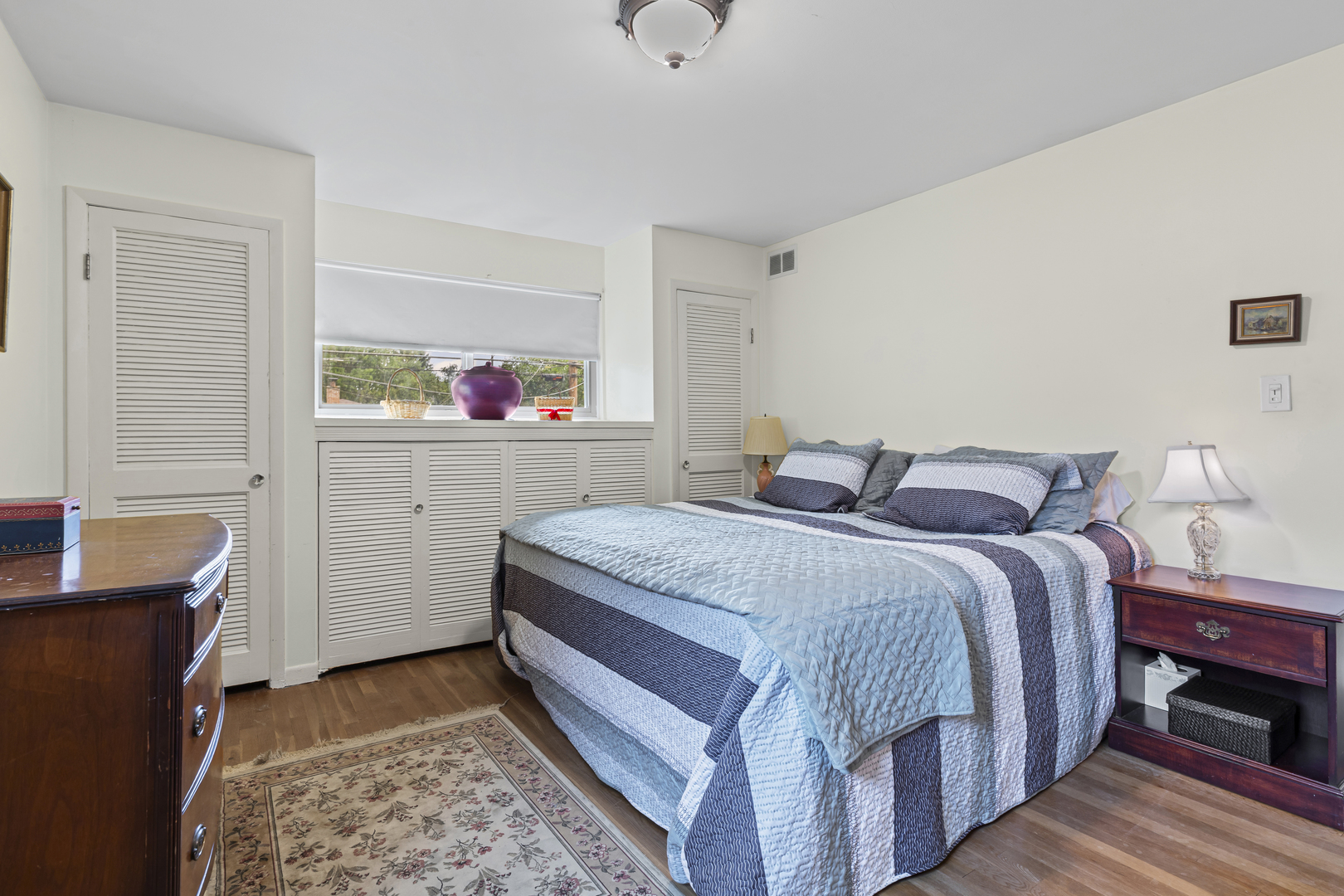 619 Leamington Avenue Wilmette, IL 60091 - Photo 11 of 19 a bedroom with a bed and a dresser