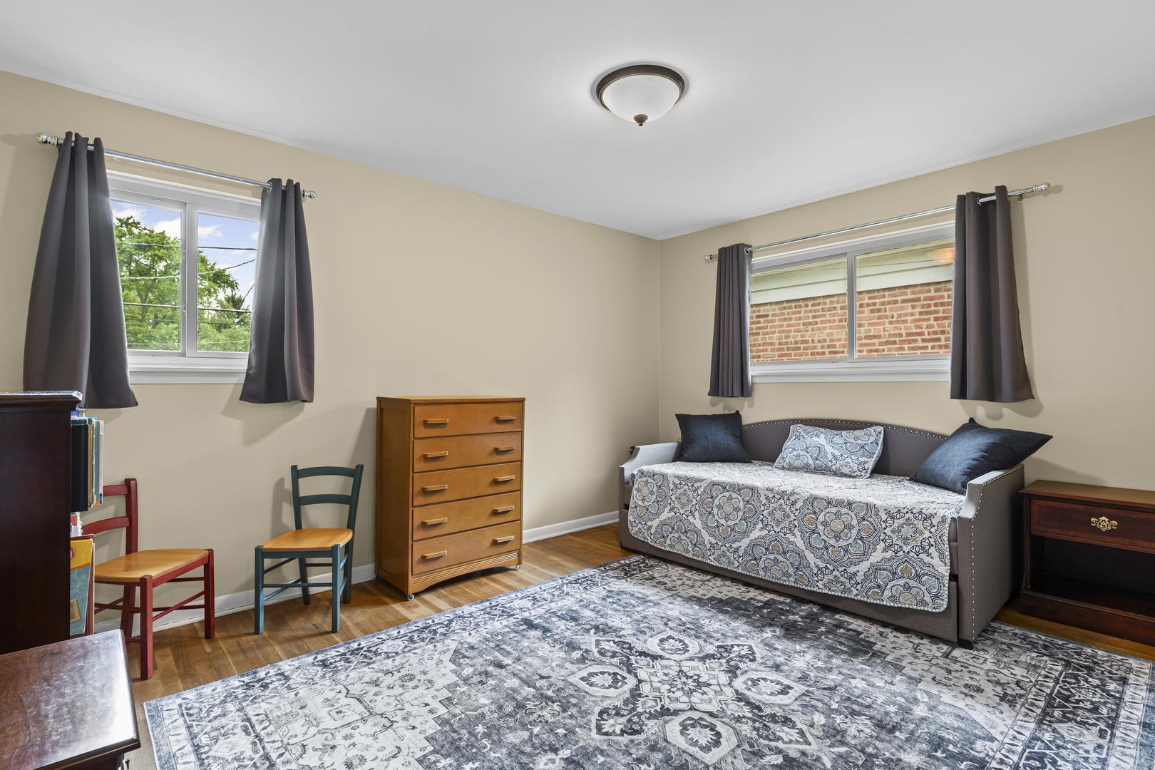 619 Leamington Avenue Wilmette, IL 60091 - Photo 12 of 19 a living room with furniture and a window