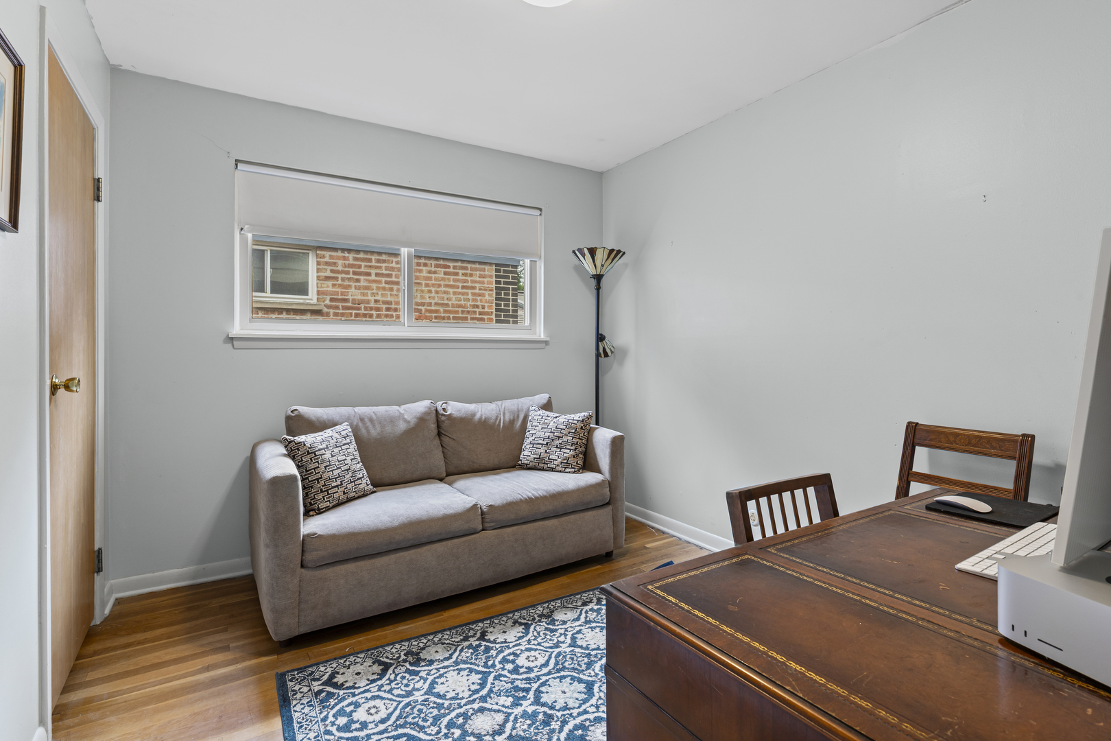 619 Leamington Avenue Wilmette, IL 60091 - Photo 13 of 19 a living room with couches and a night stand