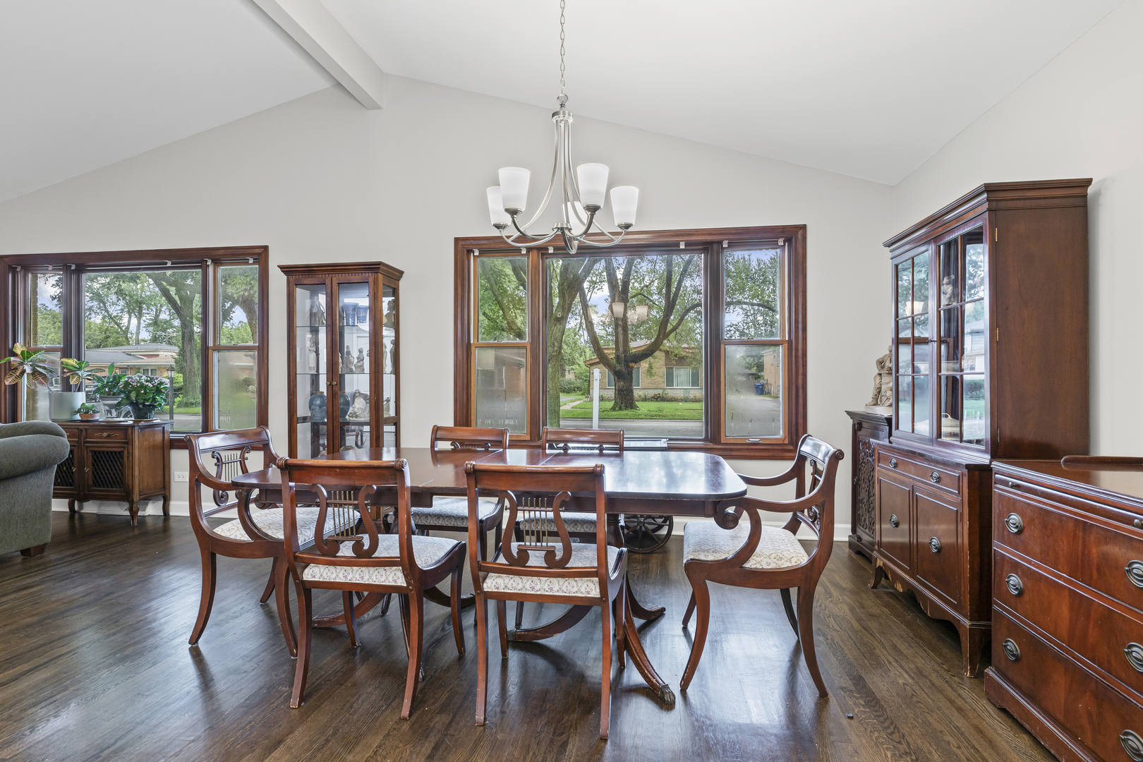 619 Leamington Avenue Wilmette, IL 60091 - Photo 8 of 19 a view of a dining room with furniture large windows and wooden floor