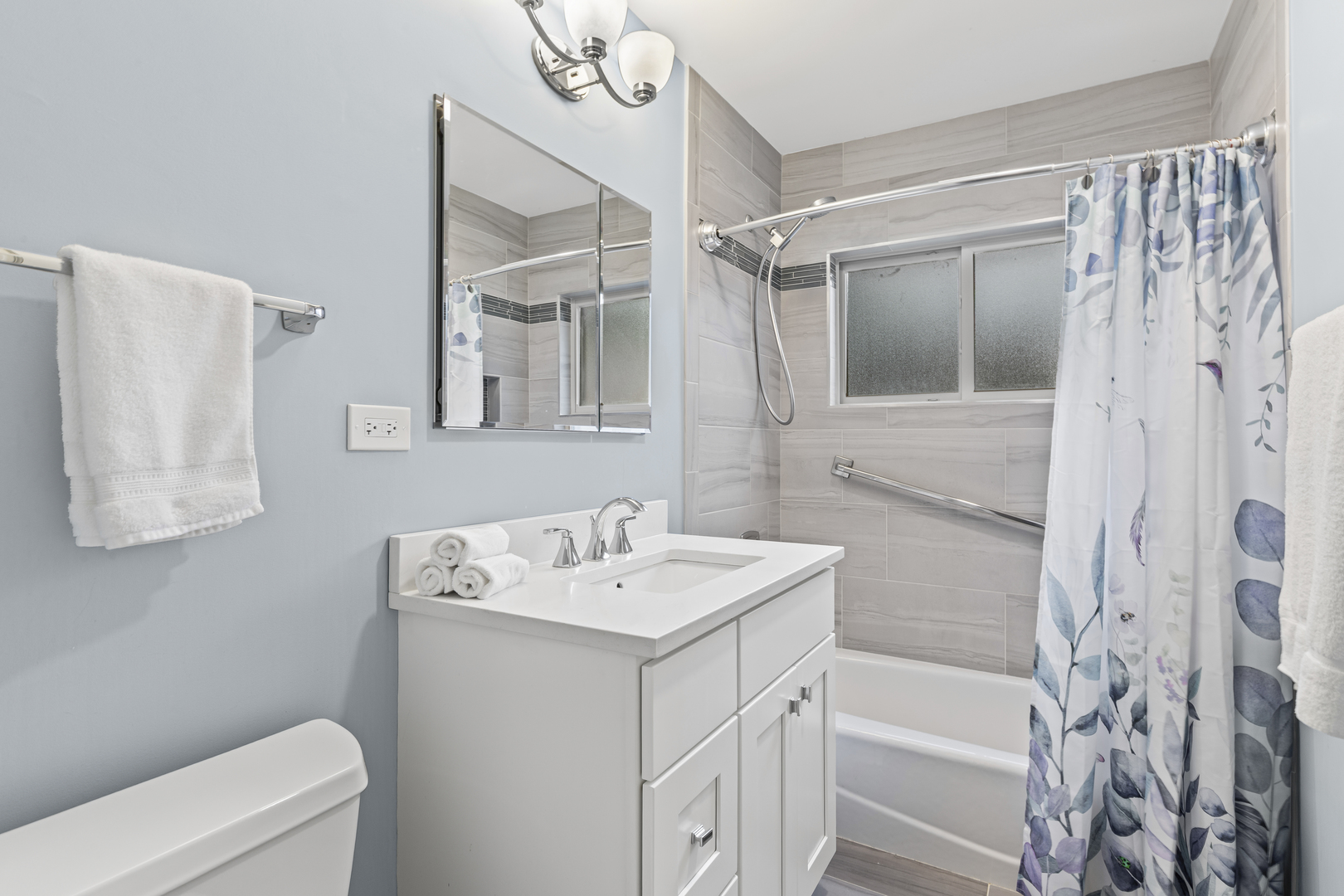 619 Leamington Avenue Wilmette, IL 60091 - Photo 9 of 19 a bathroom with a sink a toilet and shower