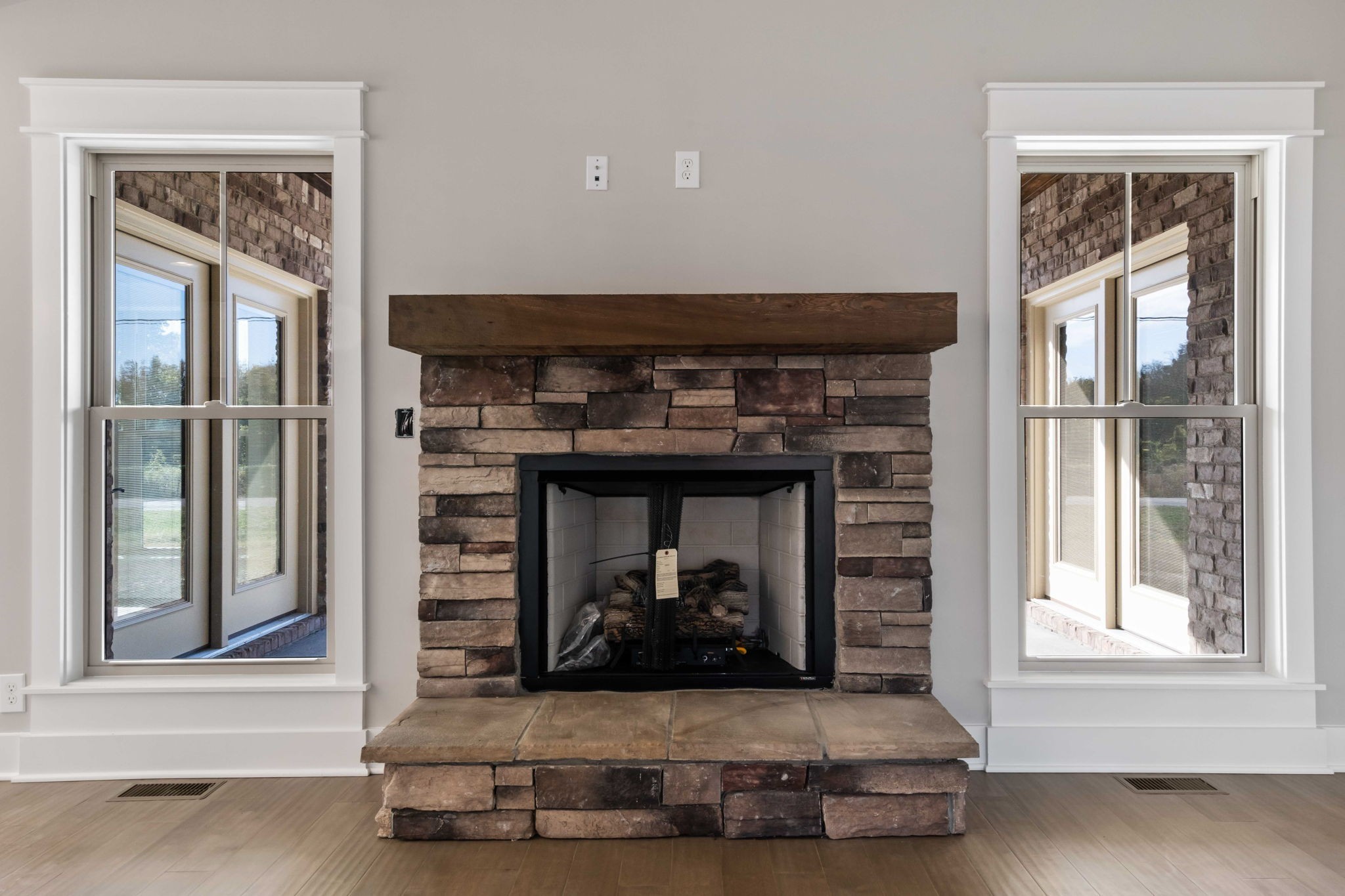2712 Carousel Drive Murfreesboro, TN 37128 - Photo 11 of 36 a living room with fireplace and a window