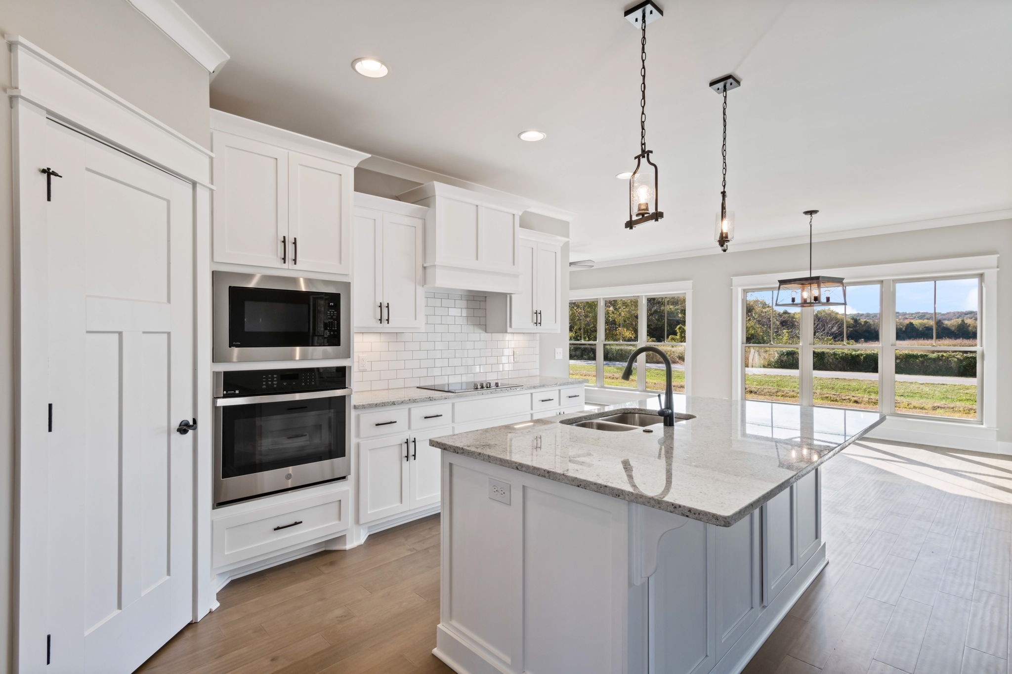 2712 Carousel Drive Murfreesboro, TN 37128 - Photo 15 of 36 a kitchen with stainless steel appliances granite countertop a sink and a refrigerator