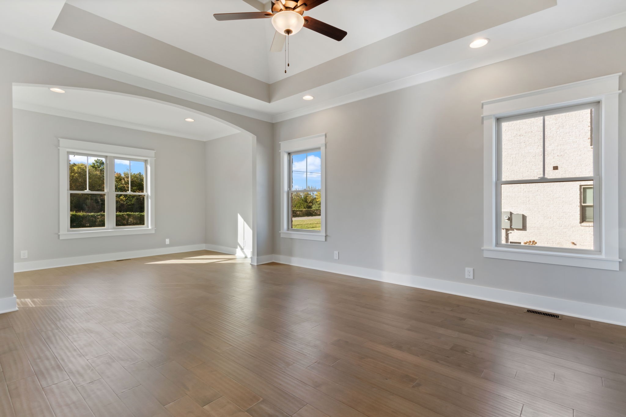 2712 Carousel Drive Murfreesboro, TN 37128 - Photo 22 of 36 an empty room with wooden floor and windows