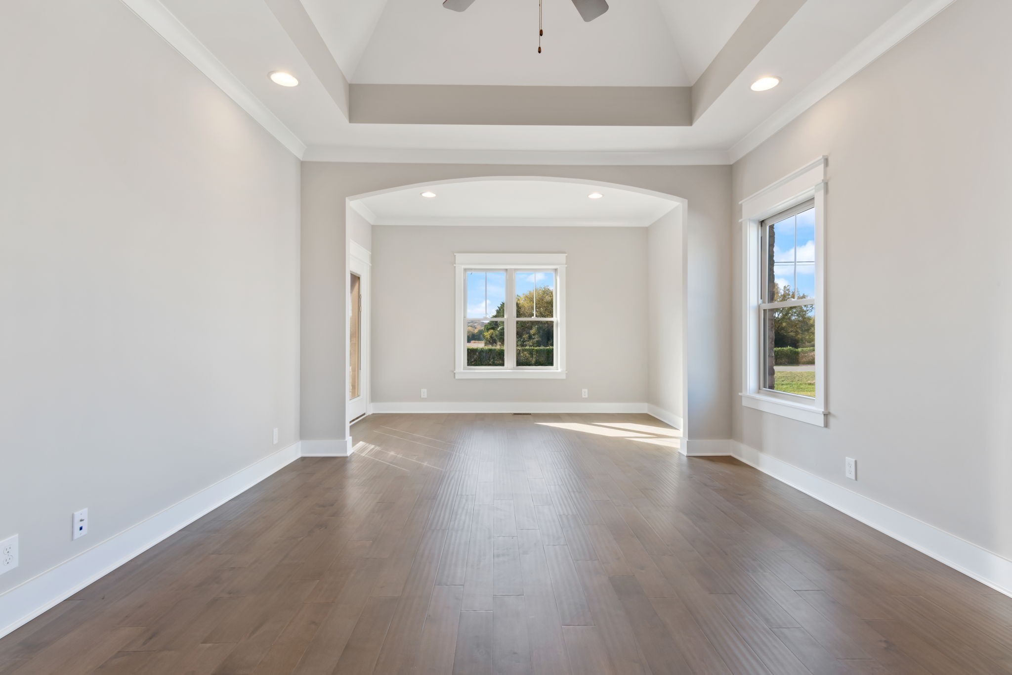 2712 Carousel Drive Murfreesboro, TN 37128 - Photo 23 of 36 an empty room with wooden floor and windows