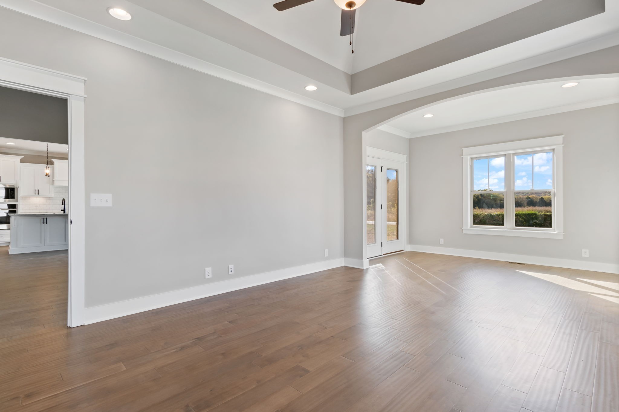 2712 Carousel Drive Murfreesboro, TN 37128 - Photo 24 of 36 an empty room with wooden floor and windows