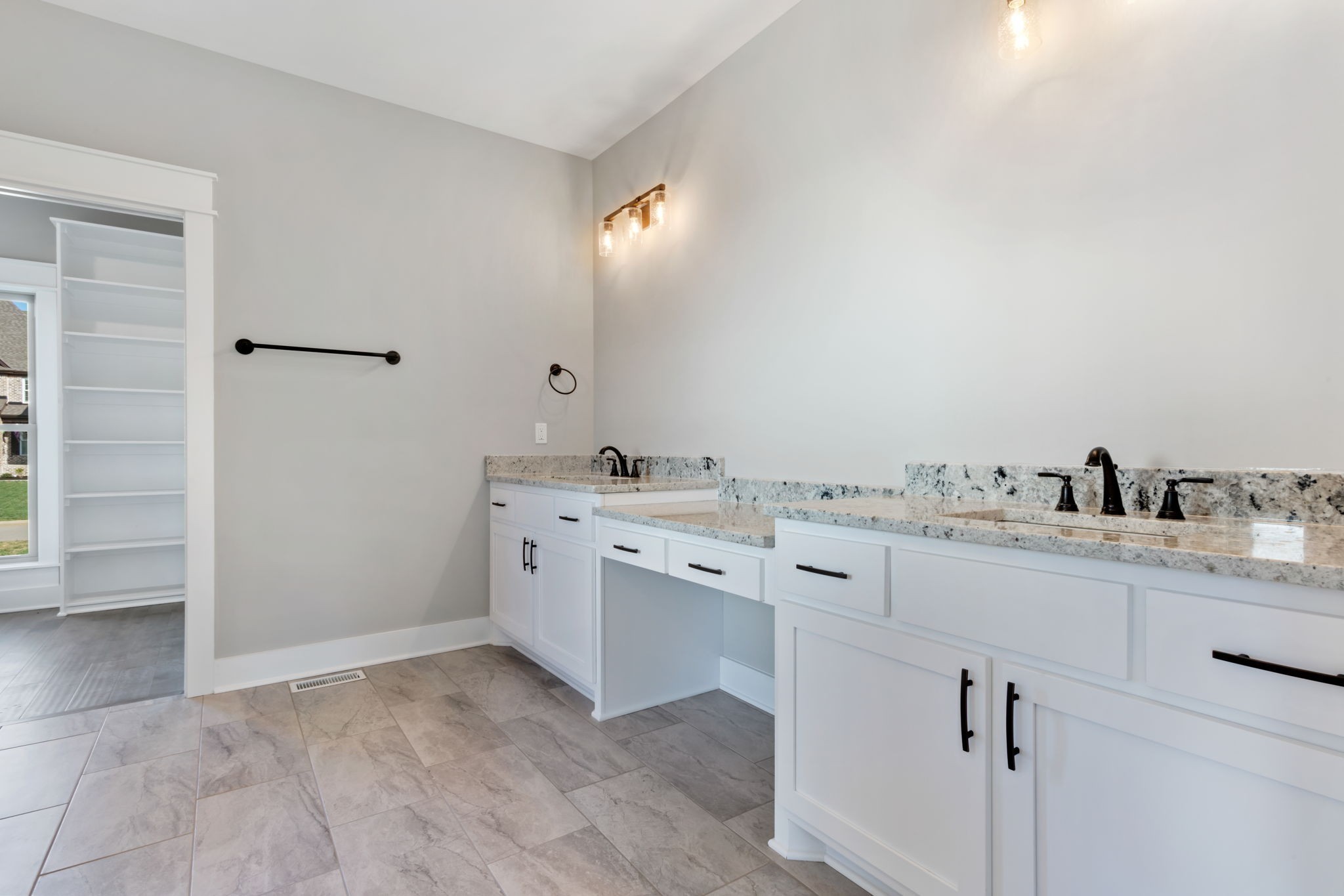 2712 Carousel Drive Murfreesboro, TN 37128 - Photo 26 of 36 a spacious bathroom with a double vanity sink and mirror