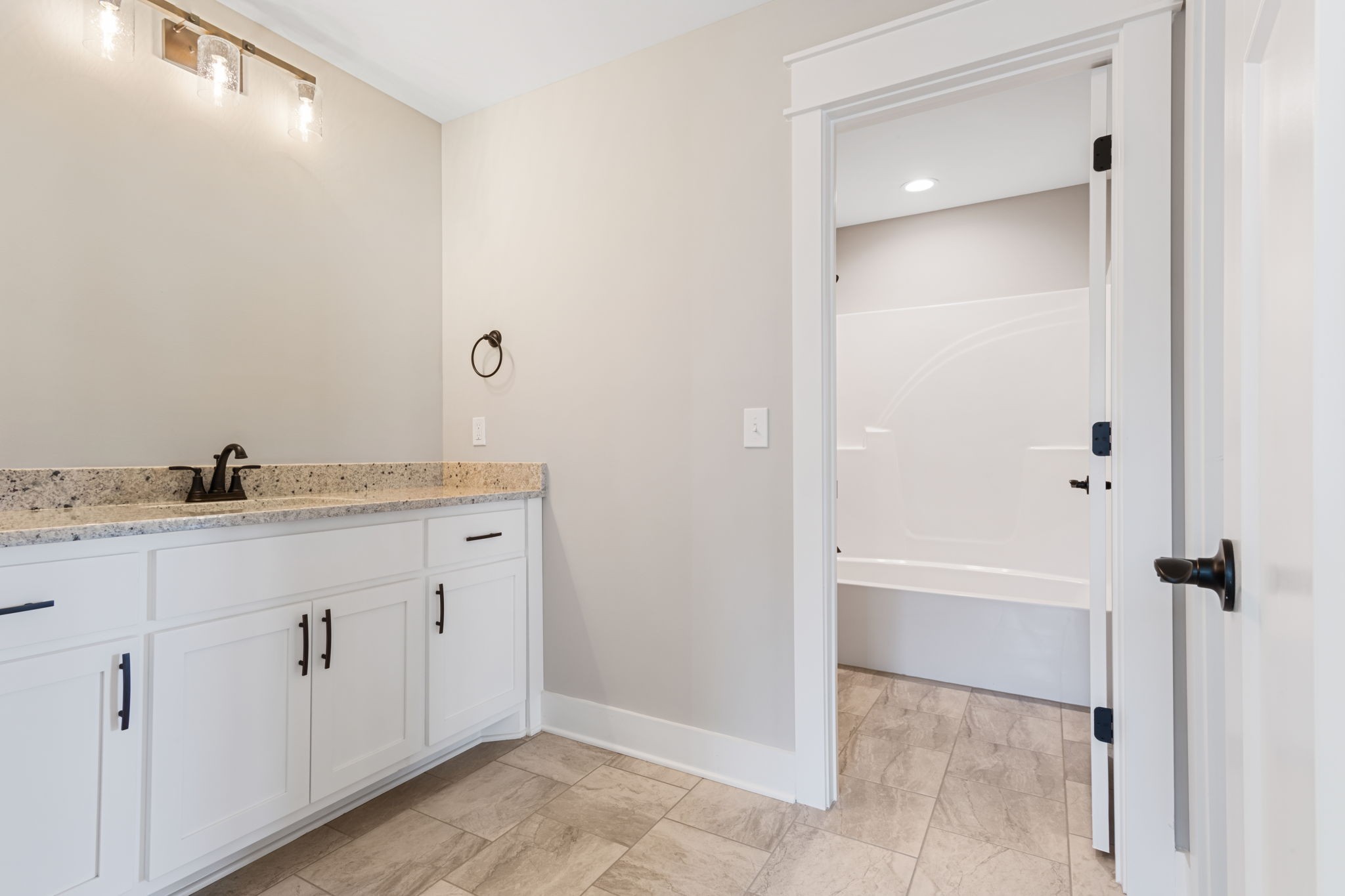 2712 Carousel Drive Murfreesboro, TN 37128 - Photo 34 of 36 a bathroom with a granite countertop sink and a mirror