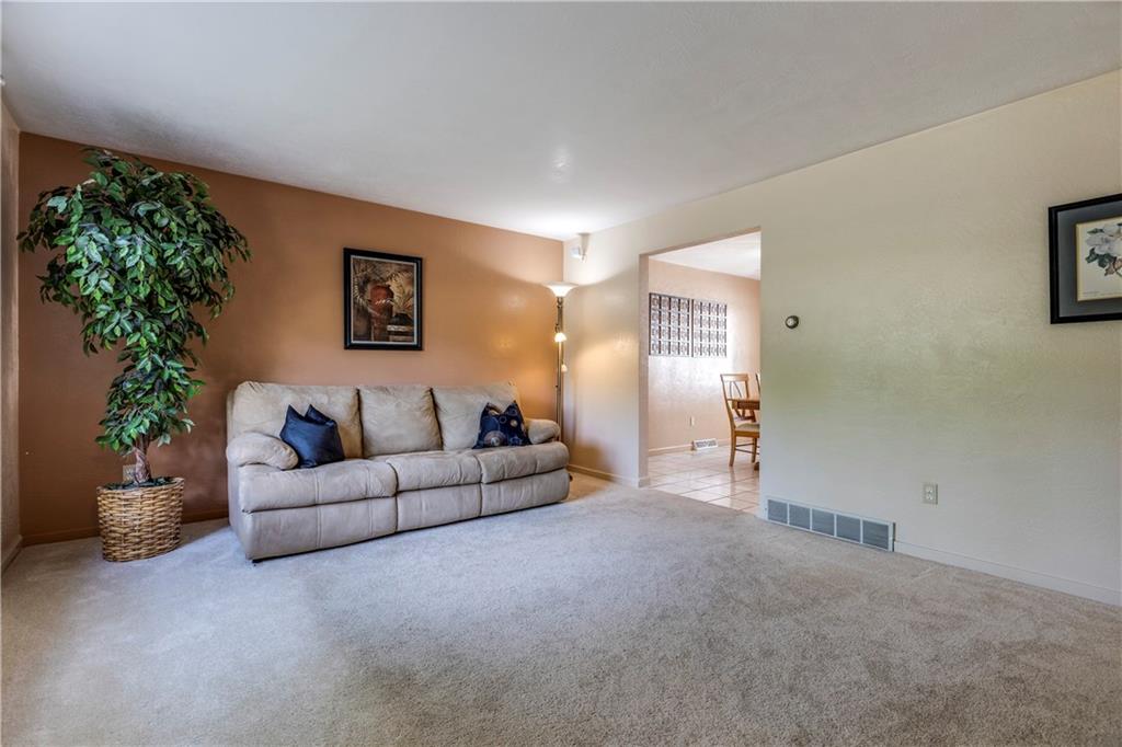 73 Beaver Grade Road McKees Rocks, PA 15136 - Photo 8 of 25 Nicely sized living room off Kitchen with plaster walls.