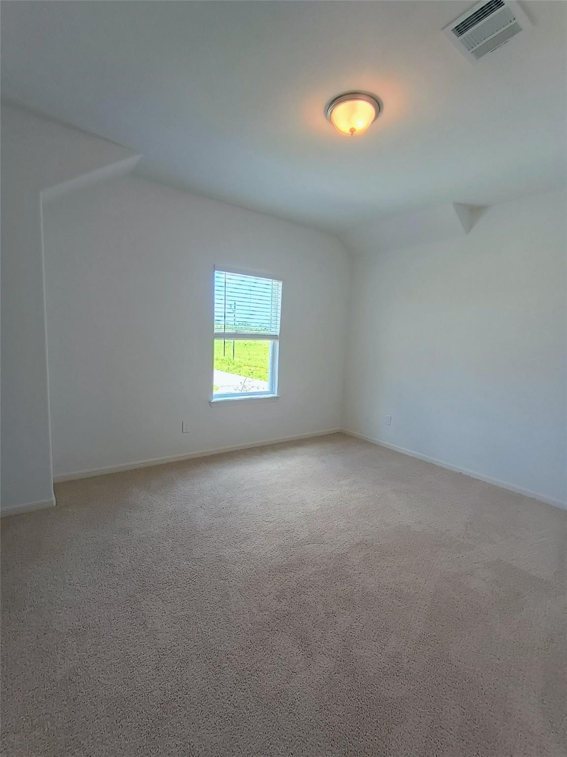 15924 Cy Young Court Splendora, TX 77372 - Photo 22 of 29 a view of an empty room and window