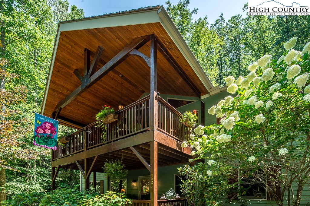 127 Apple Tree Boone, NC 28607 - Photo 2 of 50 a view of small house with a tree