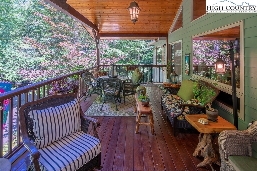 127 Apple Tree Boone, NC 28607 - Photo 21 of 50 a view of a chairs and table in the balcony