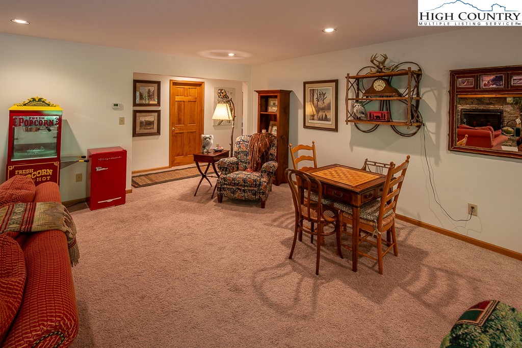 127 Apple Tree Boone, NC 28607 - Photo 35 of 50 a living room with furniture a rug and a window