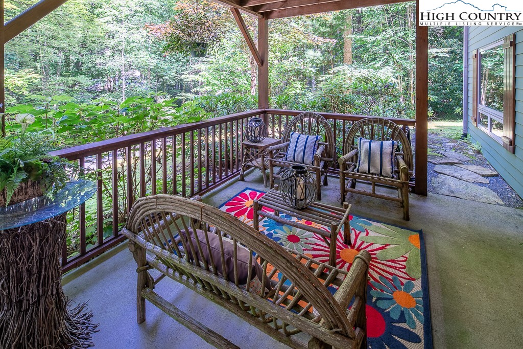 127 Apple Tree Boone, NC 28607 - Photo 43 of 50 a view of a balcony with outdoor seating
