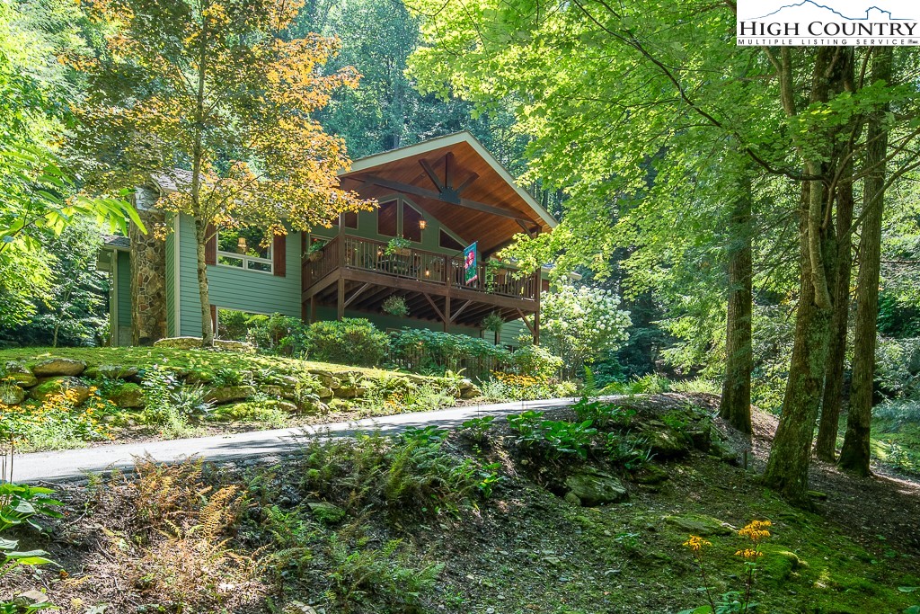127 Apple Tree Boone, NC 28607 - Photo 46 of 50 a view of a house with a yard
