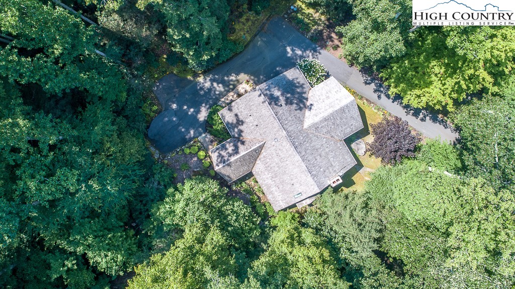 127 Apple Tree Boone, NC 28607 - Photo 50 of 50 an aerial view of residential house with outdoor space and trees all around