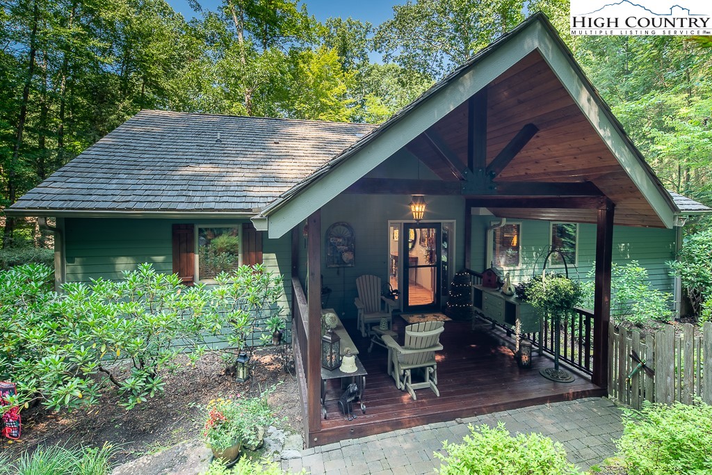 127 Apple Tree Boone, NC 28607 - Photo 5 of 50 a front view of a house with garden