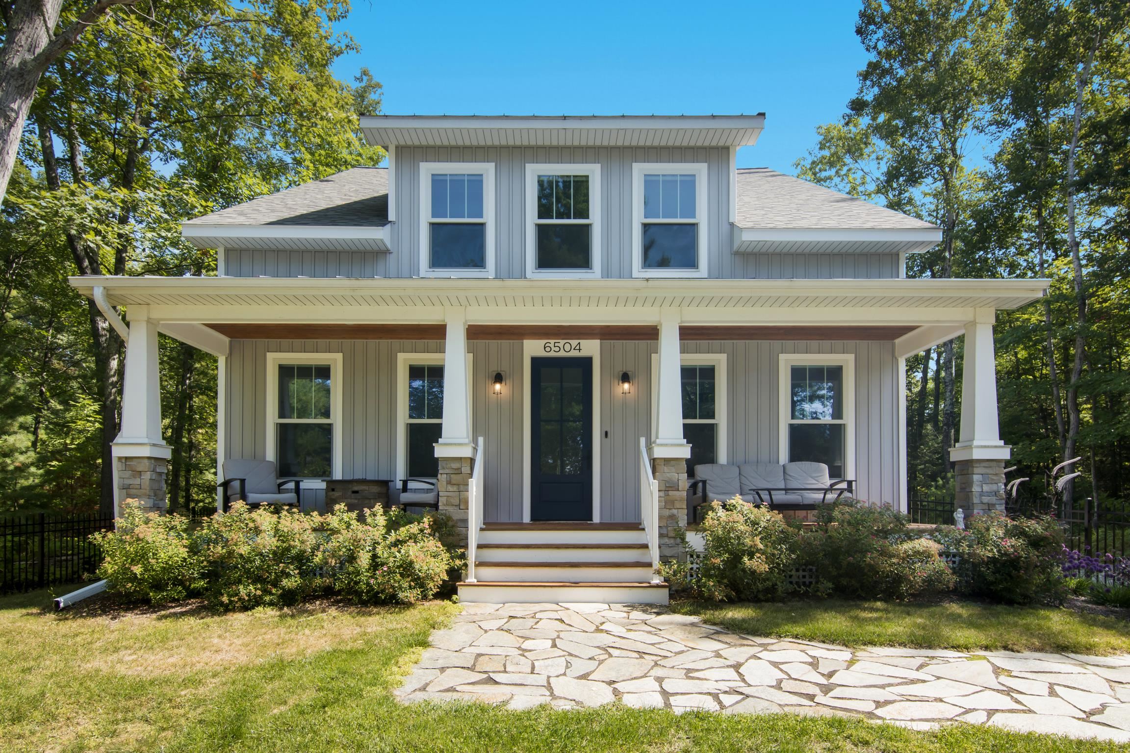 6504 Deepwater Point Road Williamsburg, MI 49690 - Photo 1 of 54