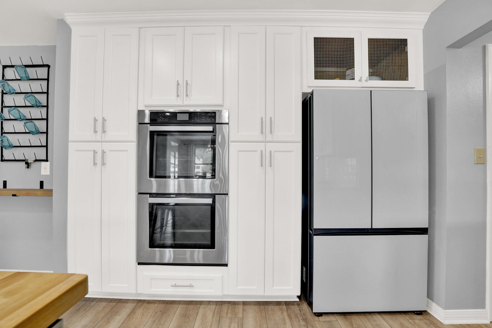 340 Ruckel Drive Niceville, FL 32578 - Photo 19 of 66 a kitchen with stainless steel appliances a refrigerator and a stove top oven