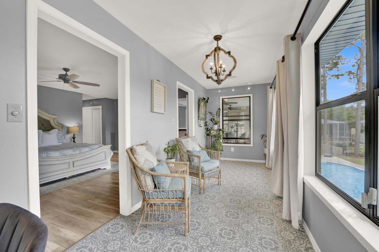 340 Ruckel Drive Niceville, FL 32578 - Photo 23 of 66 a view of a dining room with furniture window and wooden floor