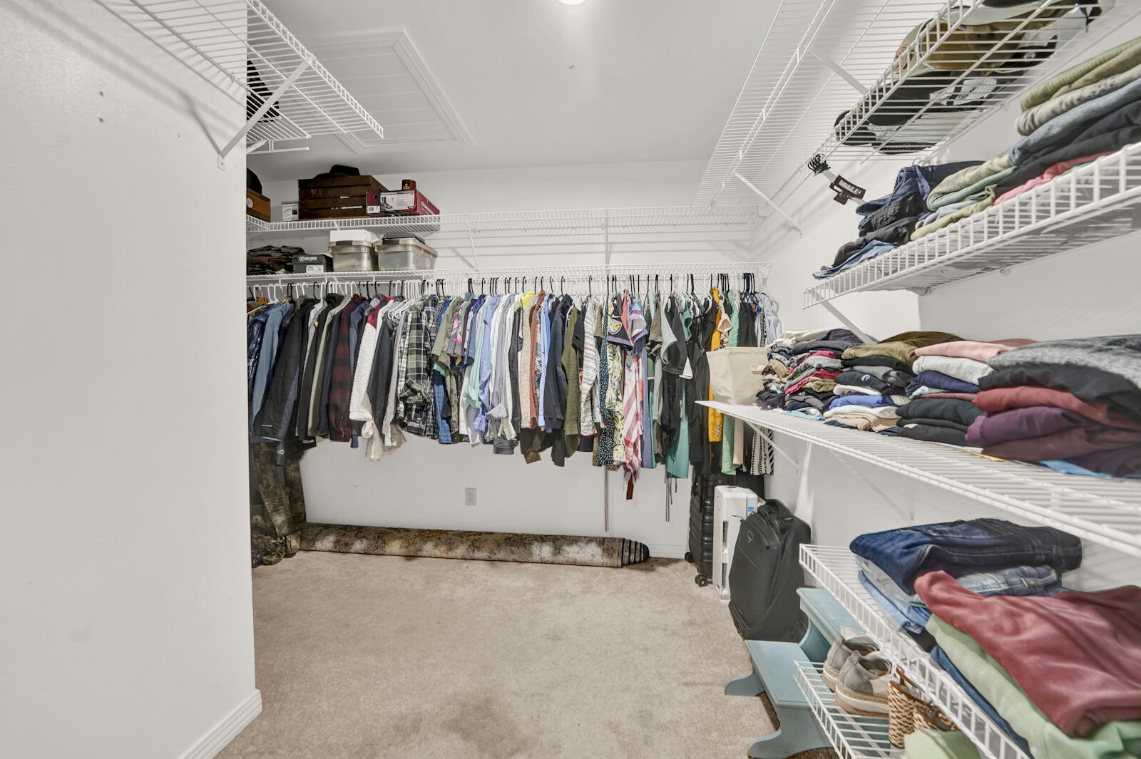 340 Ruckel Drive Niceville, FL 32578 - Photo 28 of 66 a view of walk in closet with clothes and shoes