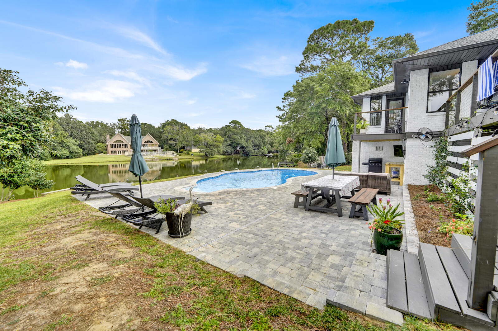 340 Ruckel Drive Niceville, FL 32578 - Photo 52 of 66 a view of a house with backyard porch and sitting area