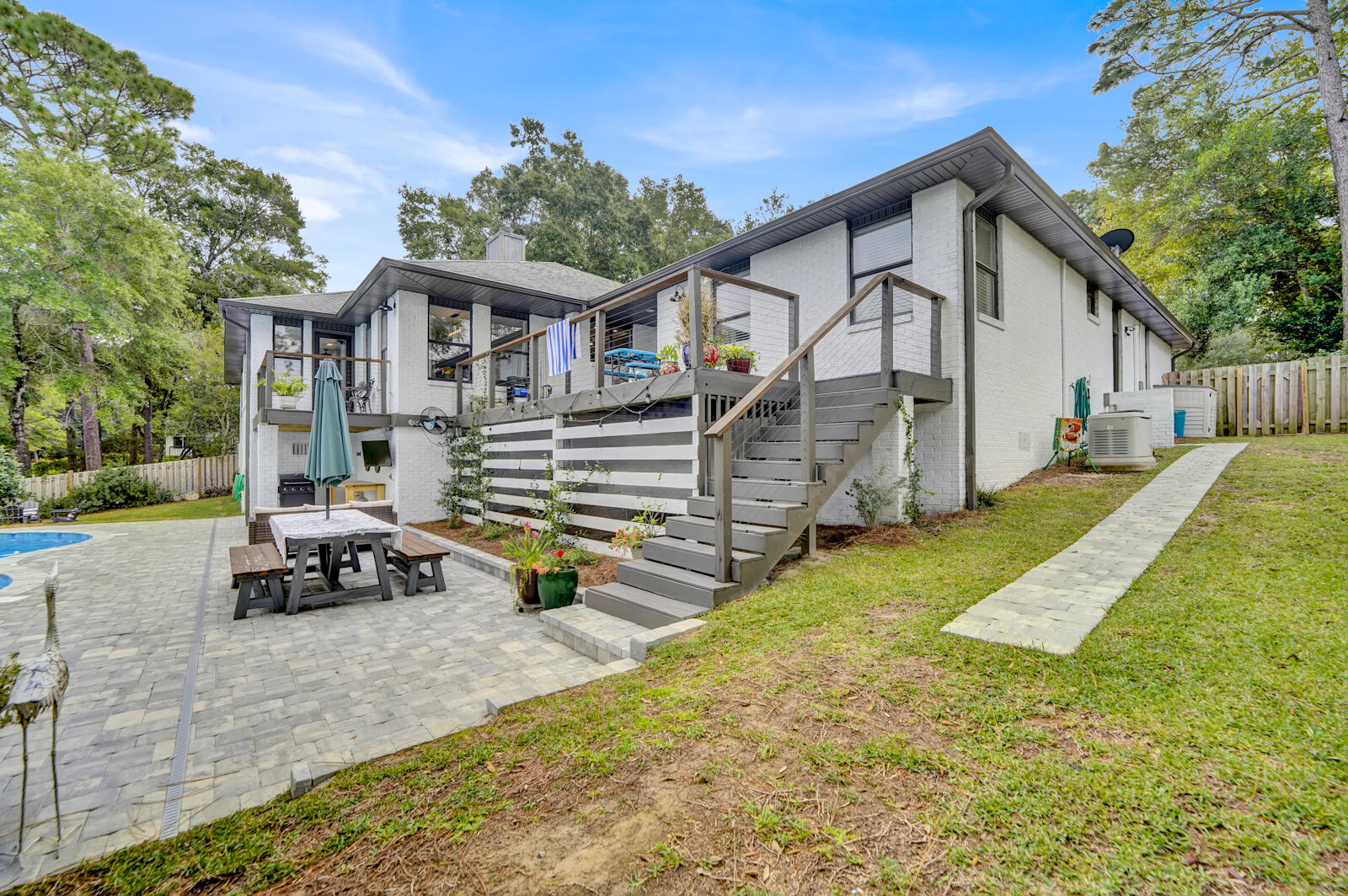 340 Ruckel Drive Niceville, FL 32578 - Photo 53 of 66 a view of a house with backyard and sitting area