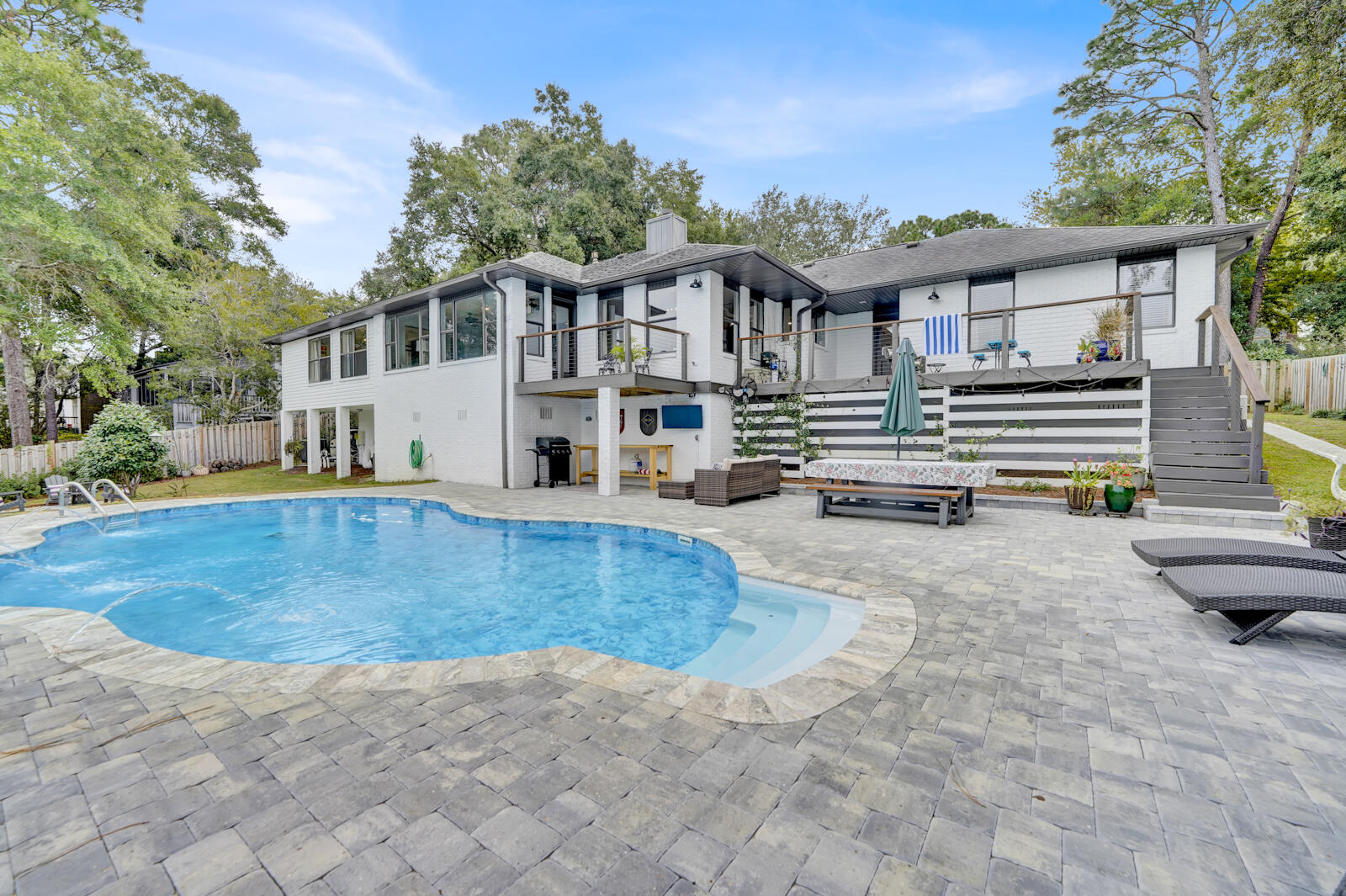340 Ruckel Drive Niceville, FL 32578 - Photo 57 of 66 a view of a house with swimming pool and sitting area
