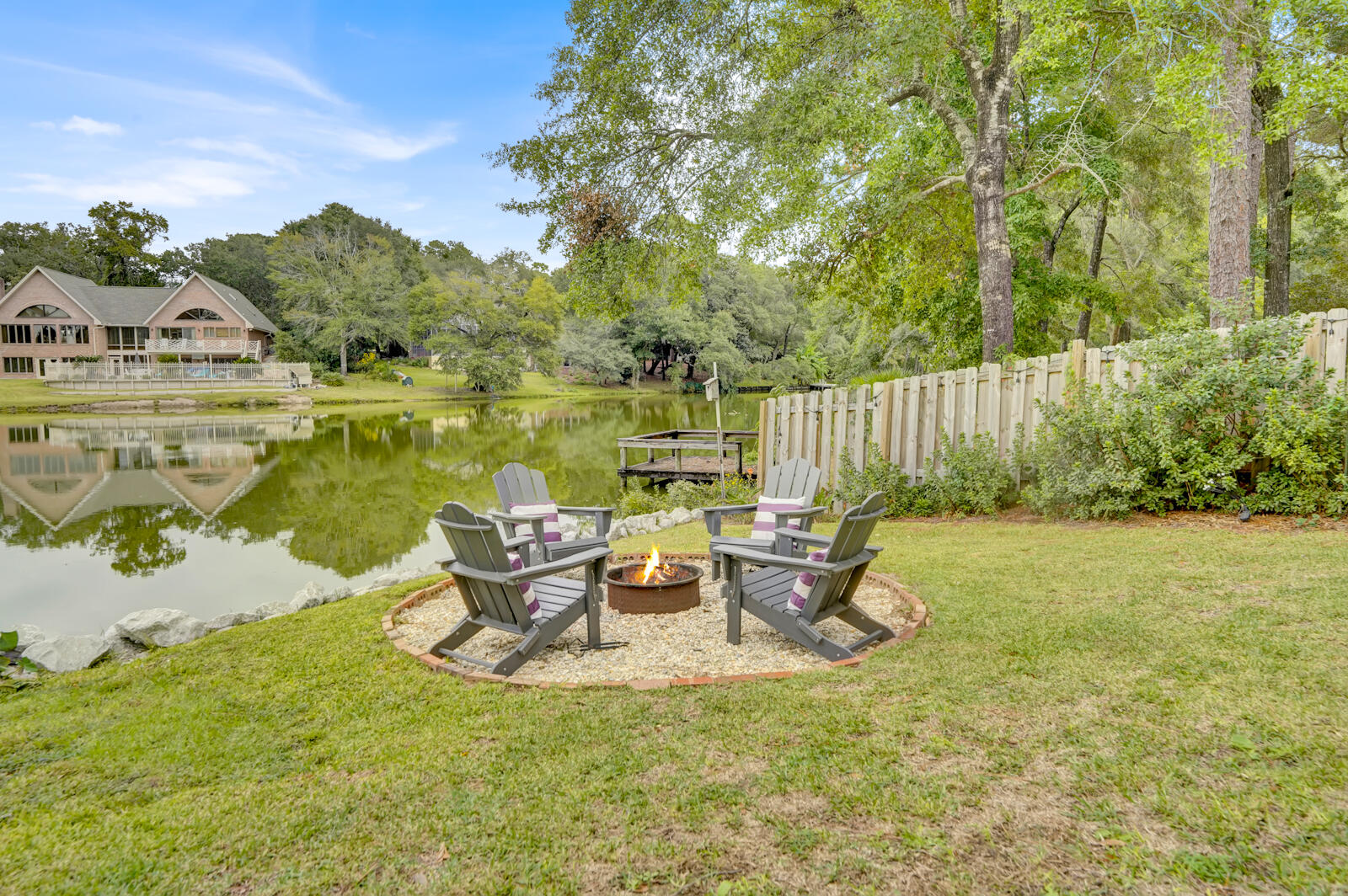 340 Ruckel Drive Niceville, FL 32578 - Photo 59 of 66 a view of a lake with a table and chairs
