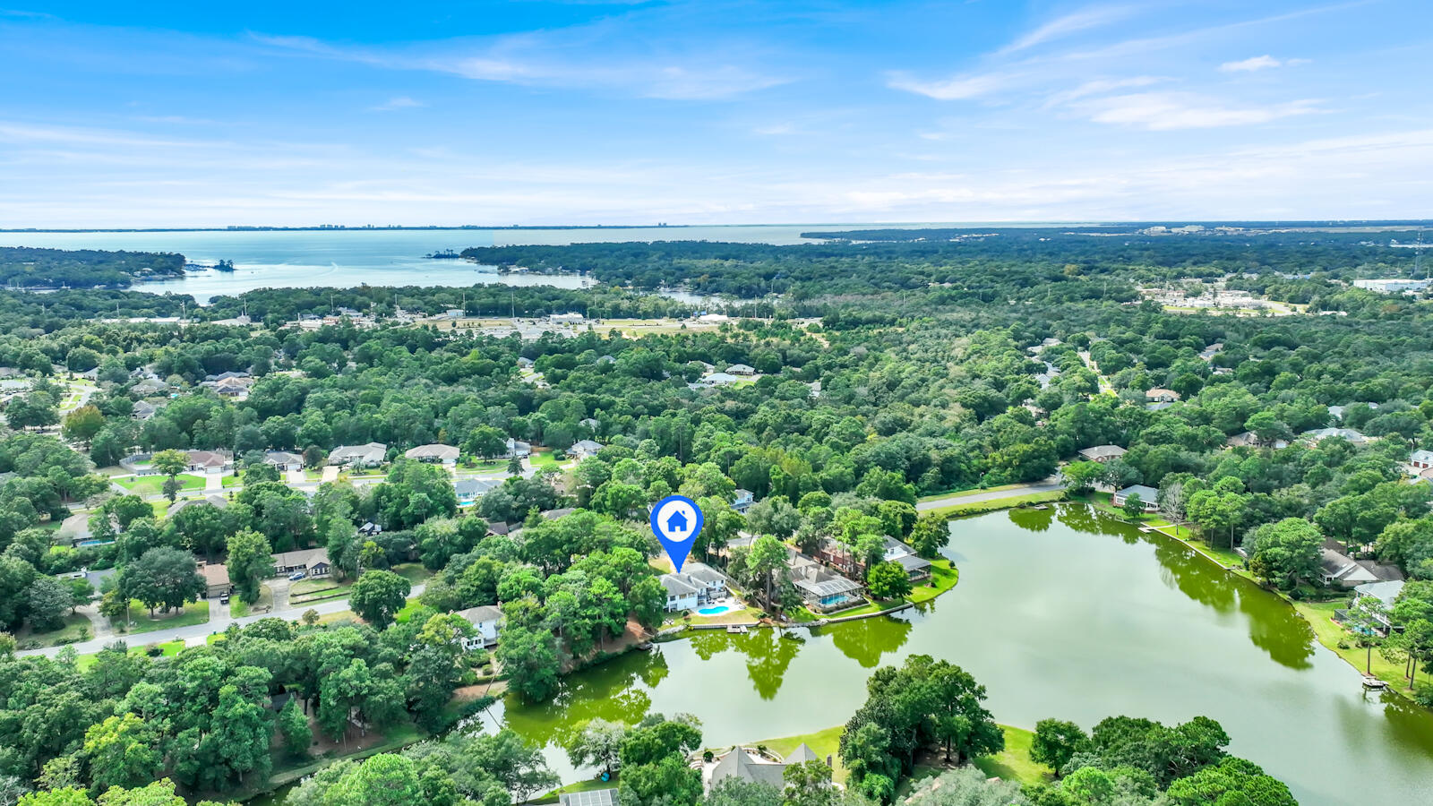 340 Ruckel Drive Niceville, FL 32578 - Photo 64 of 66 an aerial view of a houses with a yard
