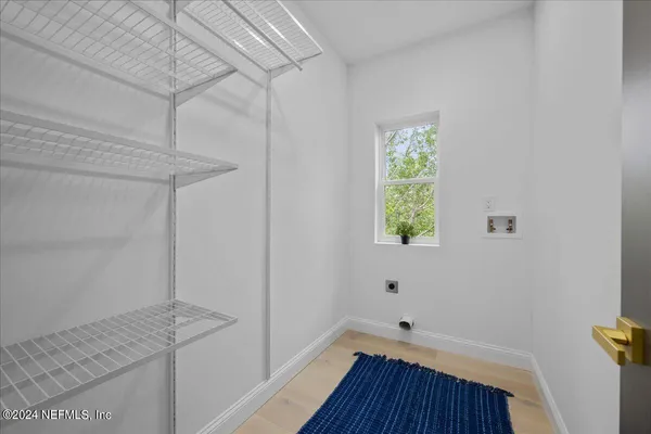 a view of small space with wooden floor