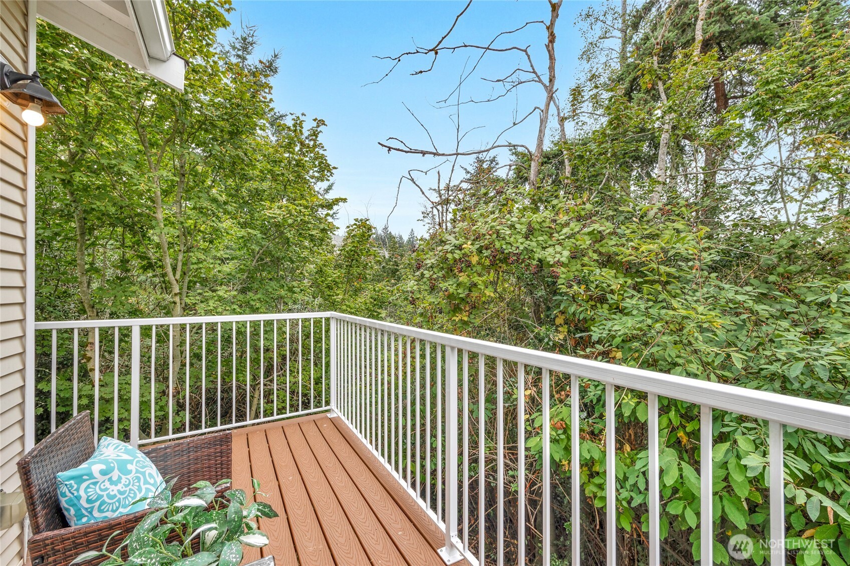 14915 38th Drive Southeast, Unit JJ1180 Bothell, WA 98012 - Photo 19 of 38 a balcony with wooden floor and outdoor space