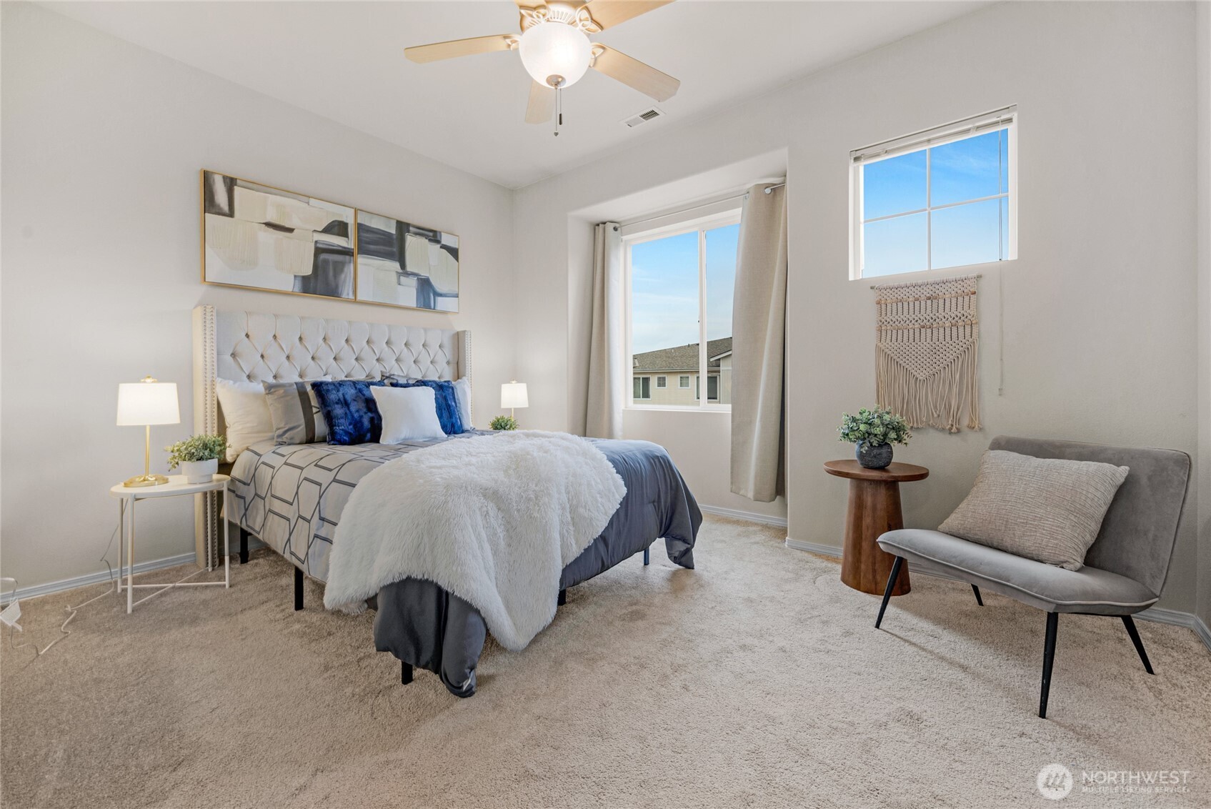 14915 38th Drive Southeast, Unit JJ1180 Bothell, WA 98012 - Photo 22 of 38 a bed room with a bed and a chair