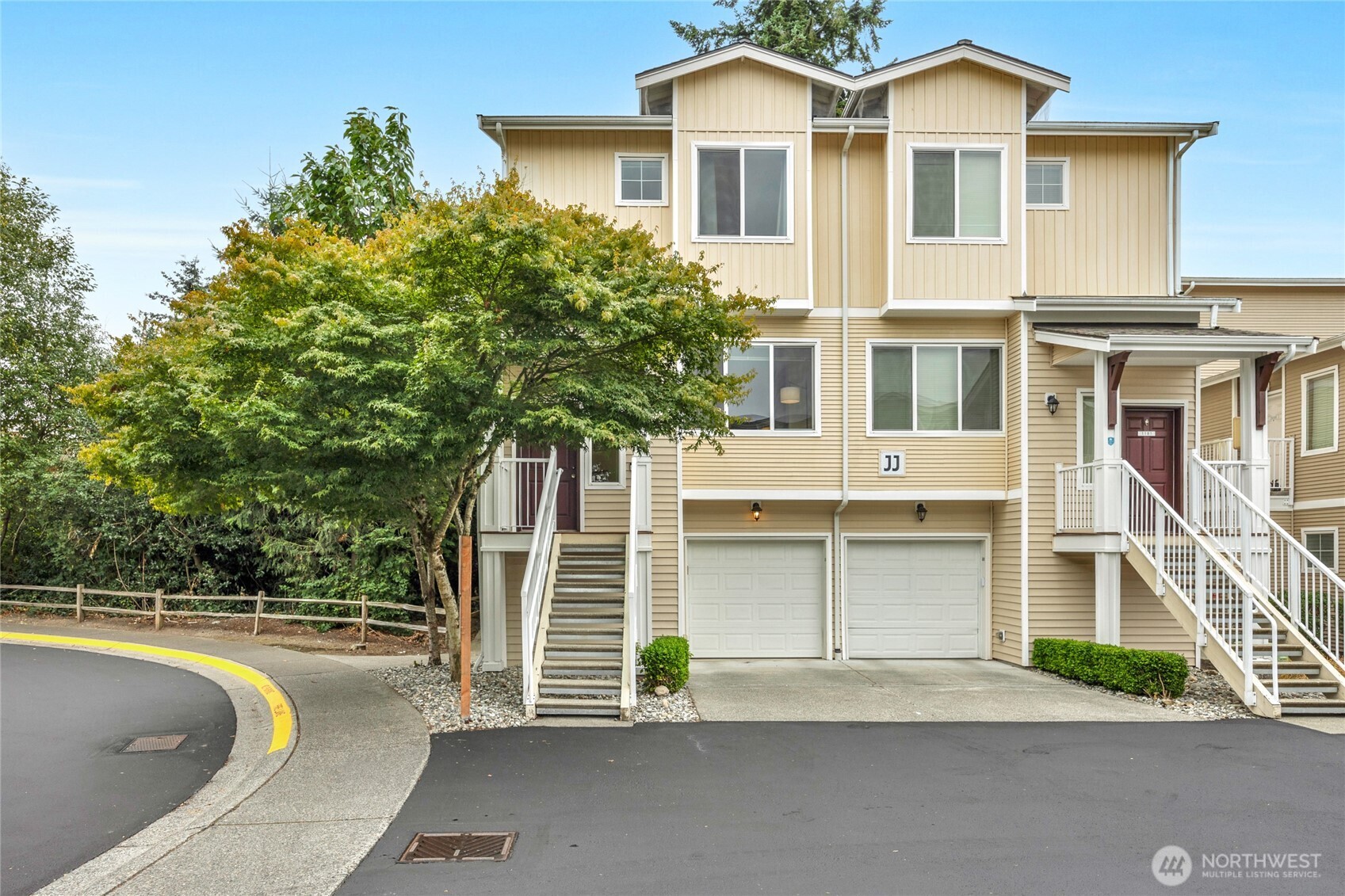 14915 38th Drive Southeast, Unit JJ1180 Bothell, WA 98012 - Photo 3 of 38 a view of a house with a yard