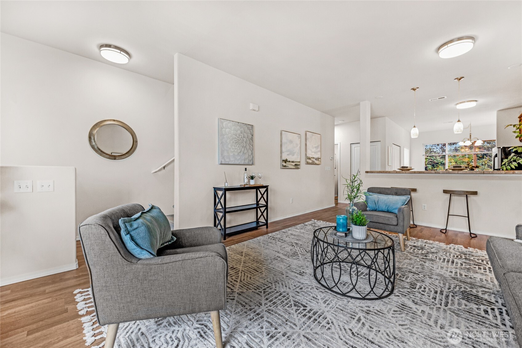 14915 38th Drive Southeast, Unit JJ1180 Bothell, WA 98012 - Photo 7 of 38 a living room with furniture and kitchen view